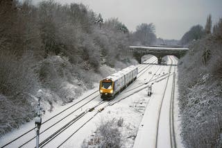 A train makes its way along the Hunt’s Cross line in Liverpool