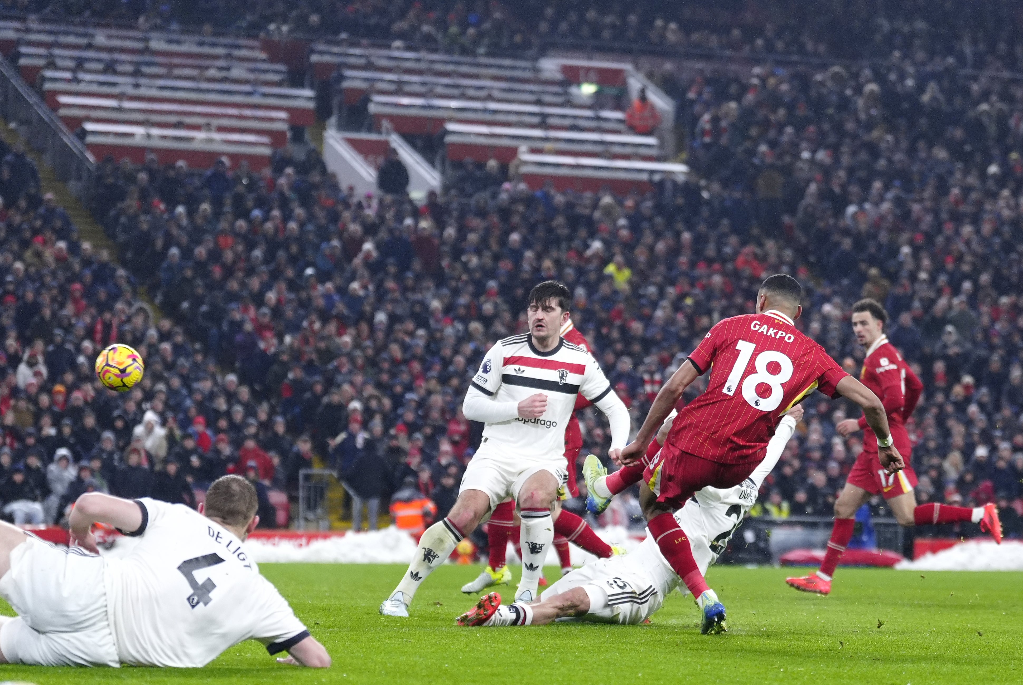 Cody Gakpo, right, scores Liverpool’s first goal