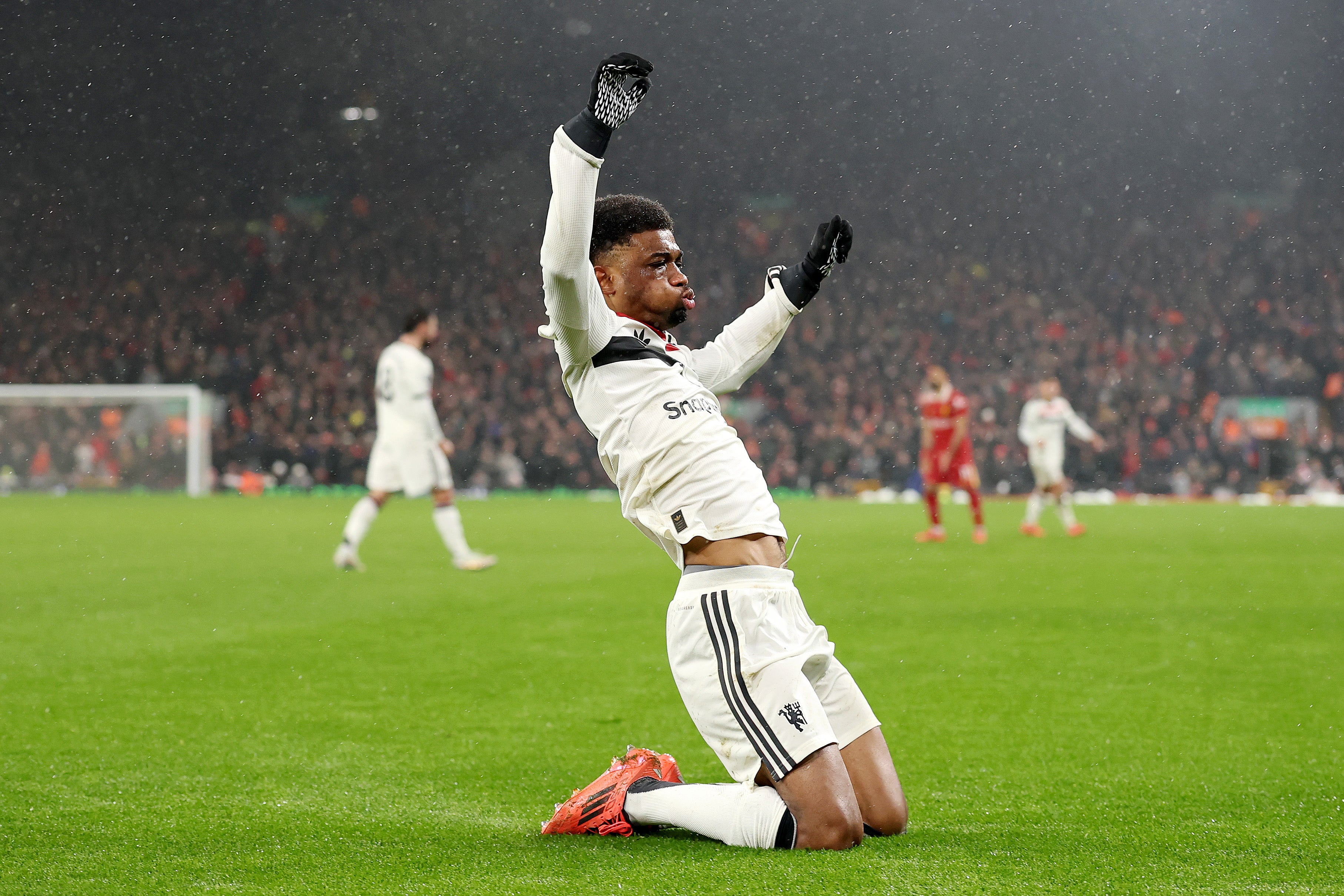 Amad Diallo celebrates after scoring Manchester United's equaliser