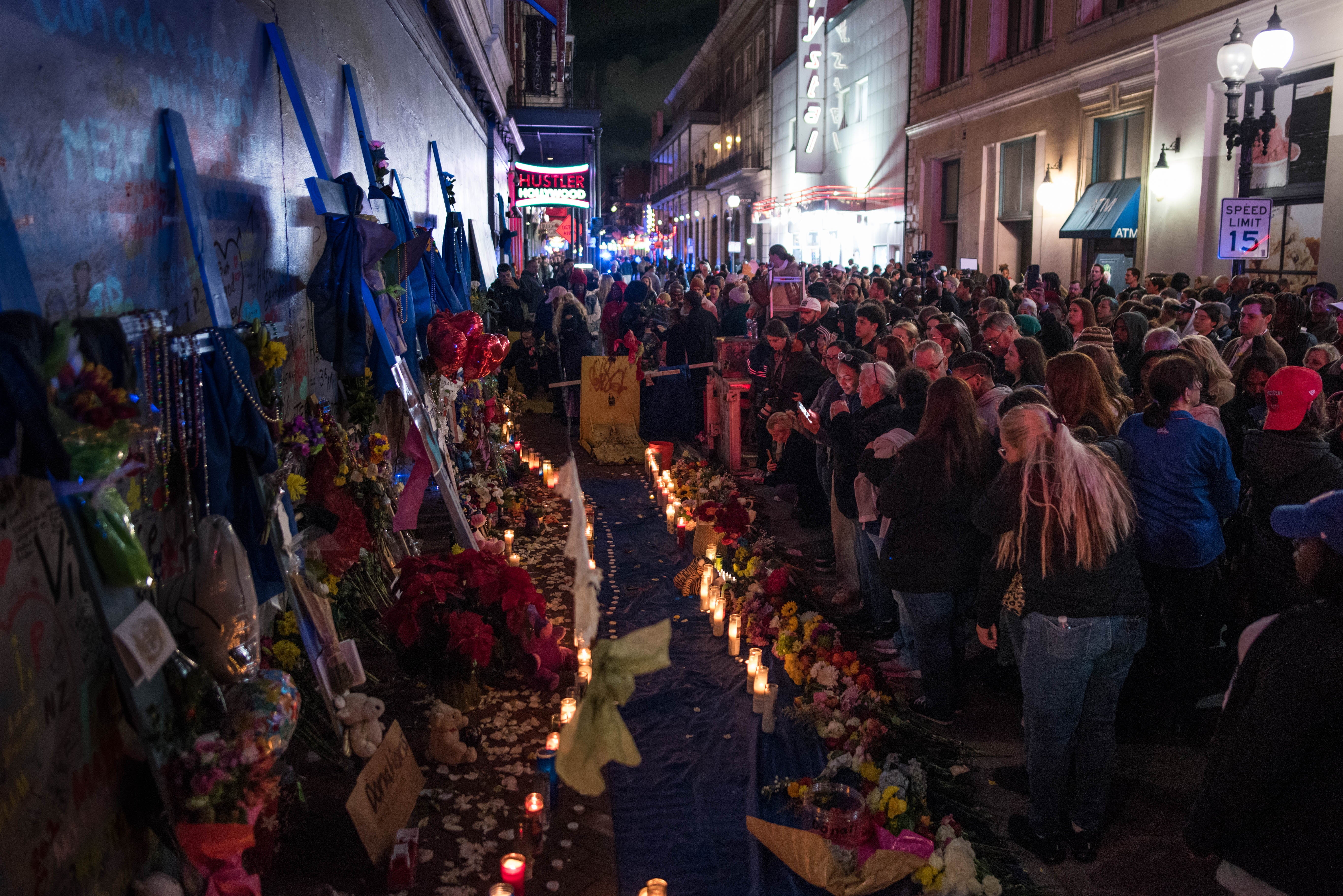 A vigil is held near where 14 were killed in New Orleans’ French Quarter during a terror attack on New Year’s Day. A man was arrested for allegedly making a bomb threat in the same neighborhood on Saturday