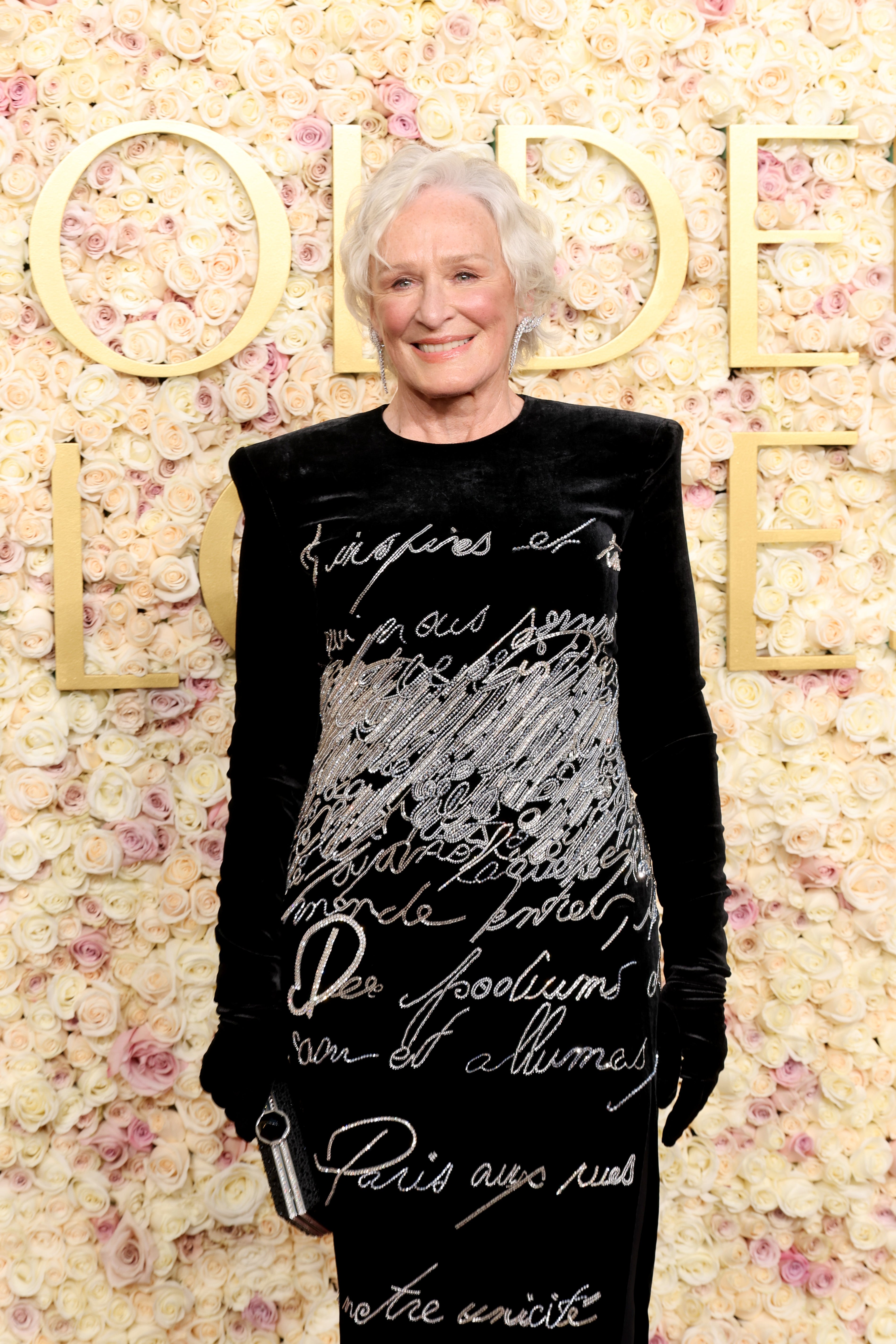 Glenn Close wears a full-coverage black velvet gown on the Golden Globes red carpet