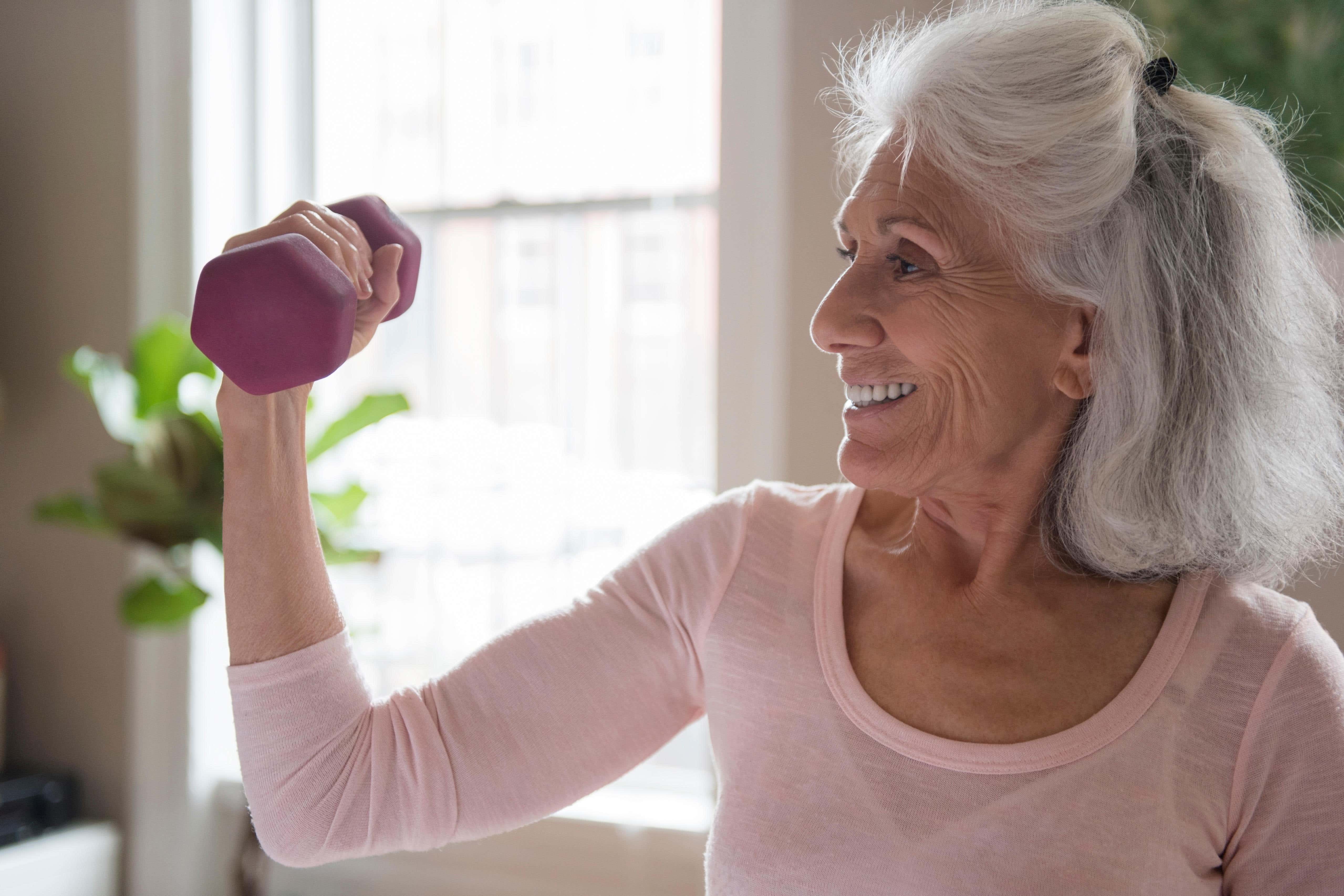 Lifting weights can lead to an array of physical and mental health benefits (Alamy/PA)