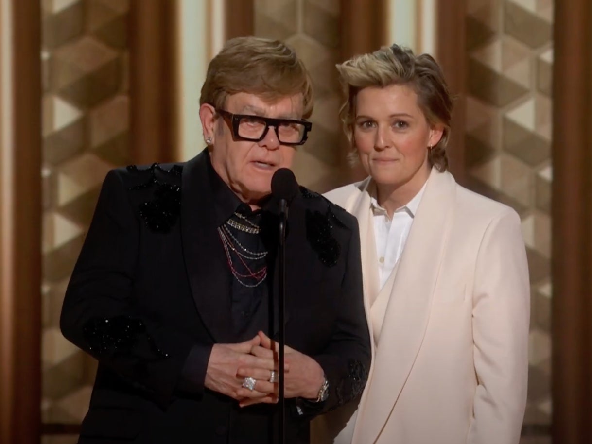 Elton John presented an award with country singer Brandi Carlile