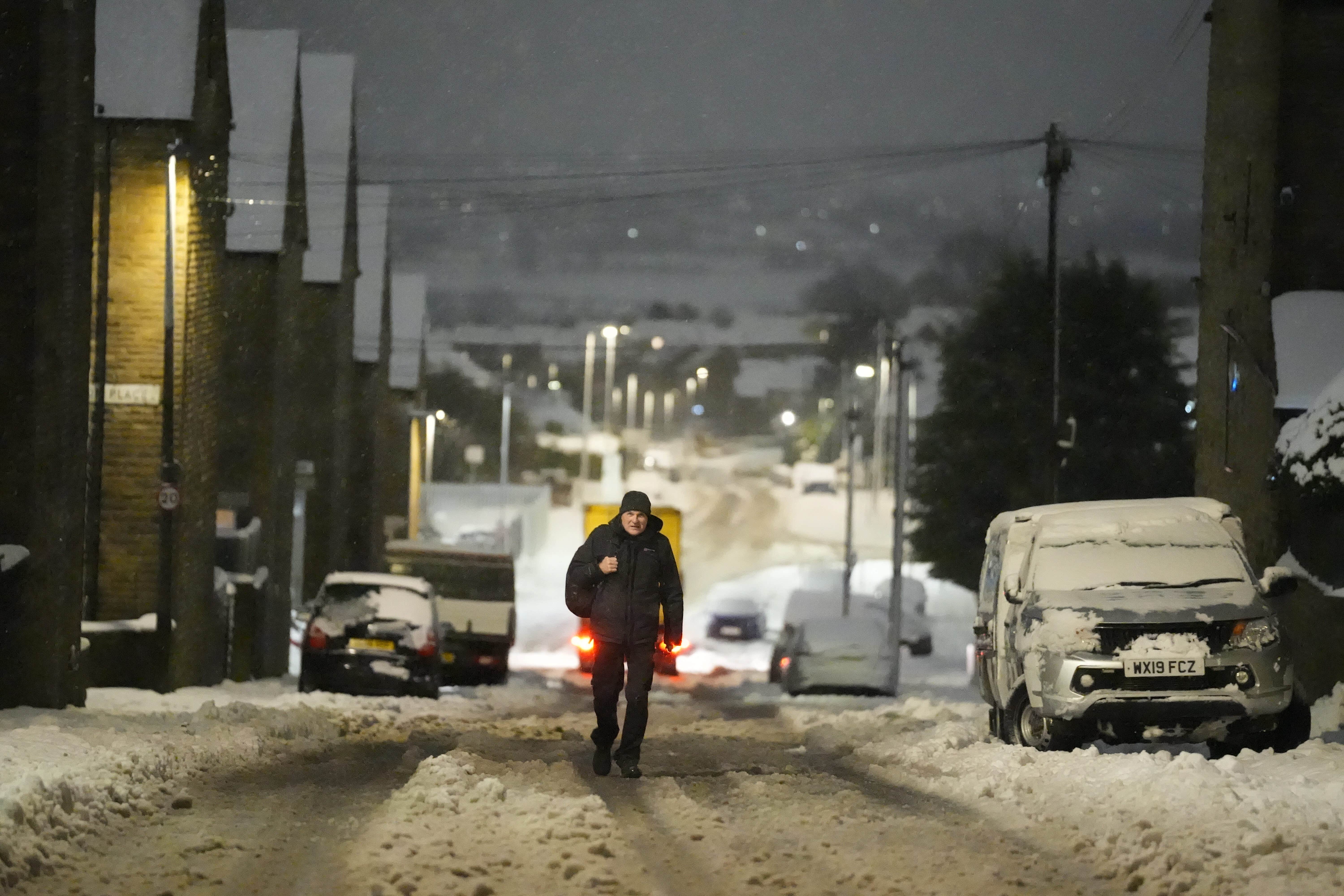 Many commuters are suffering travel disruption from severe weather, with major roads closed and railway lines blocked (Danny Lawson/PA)