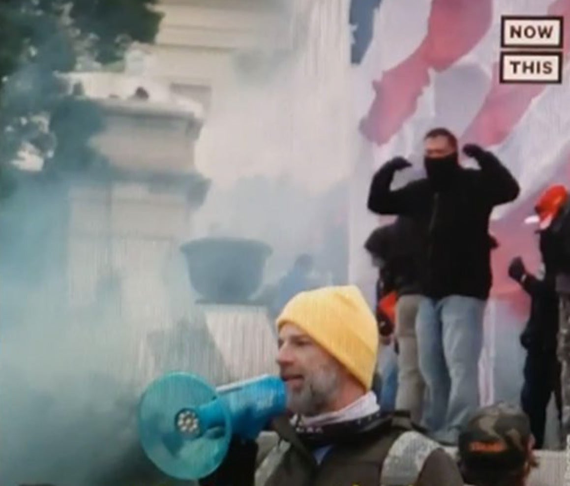 Treniss Evans pictured with a megaphone outside the Capitol