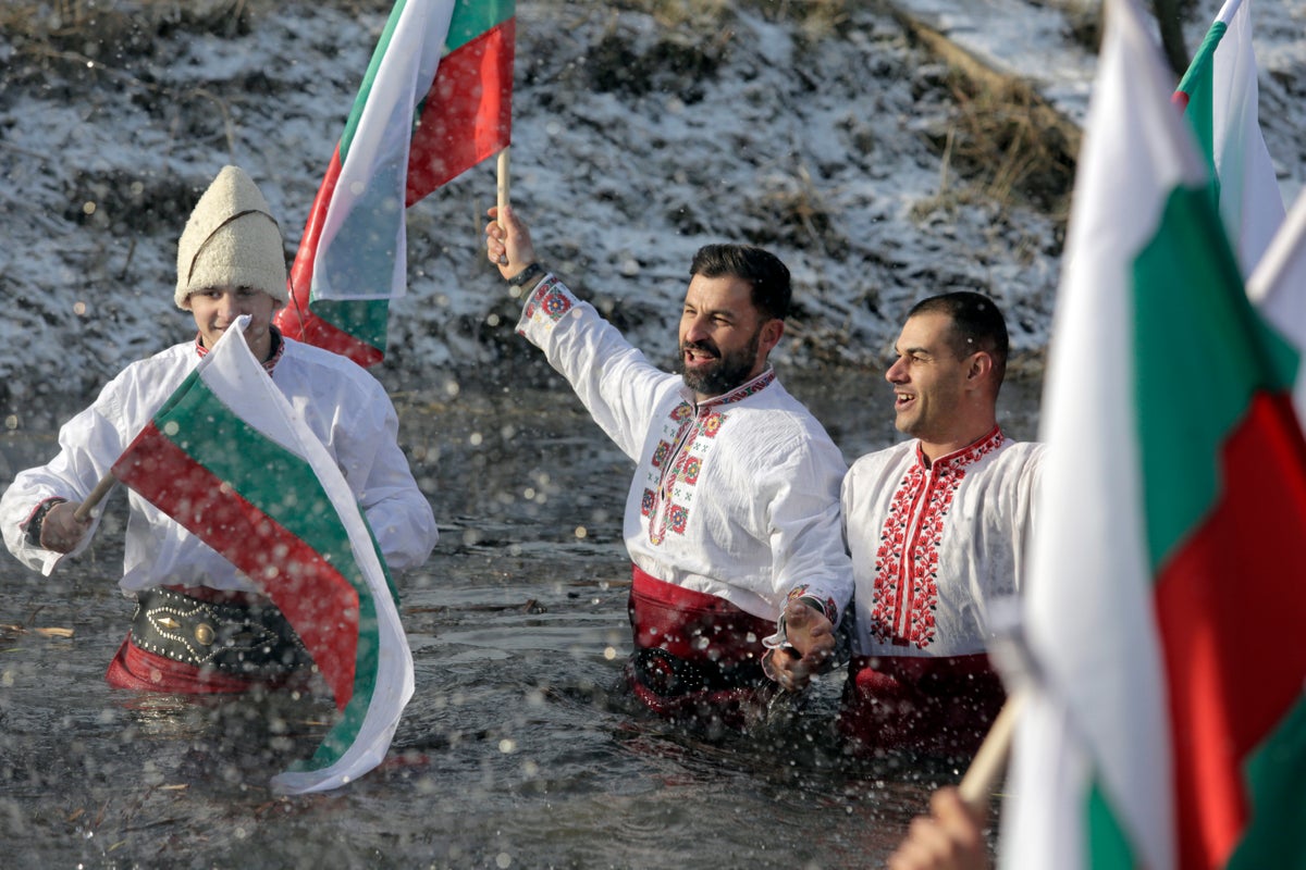 Bulgarians celebrate the feast of Epiphany with a…