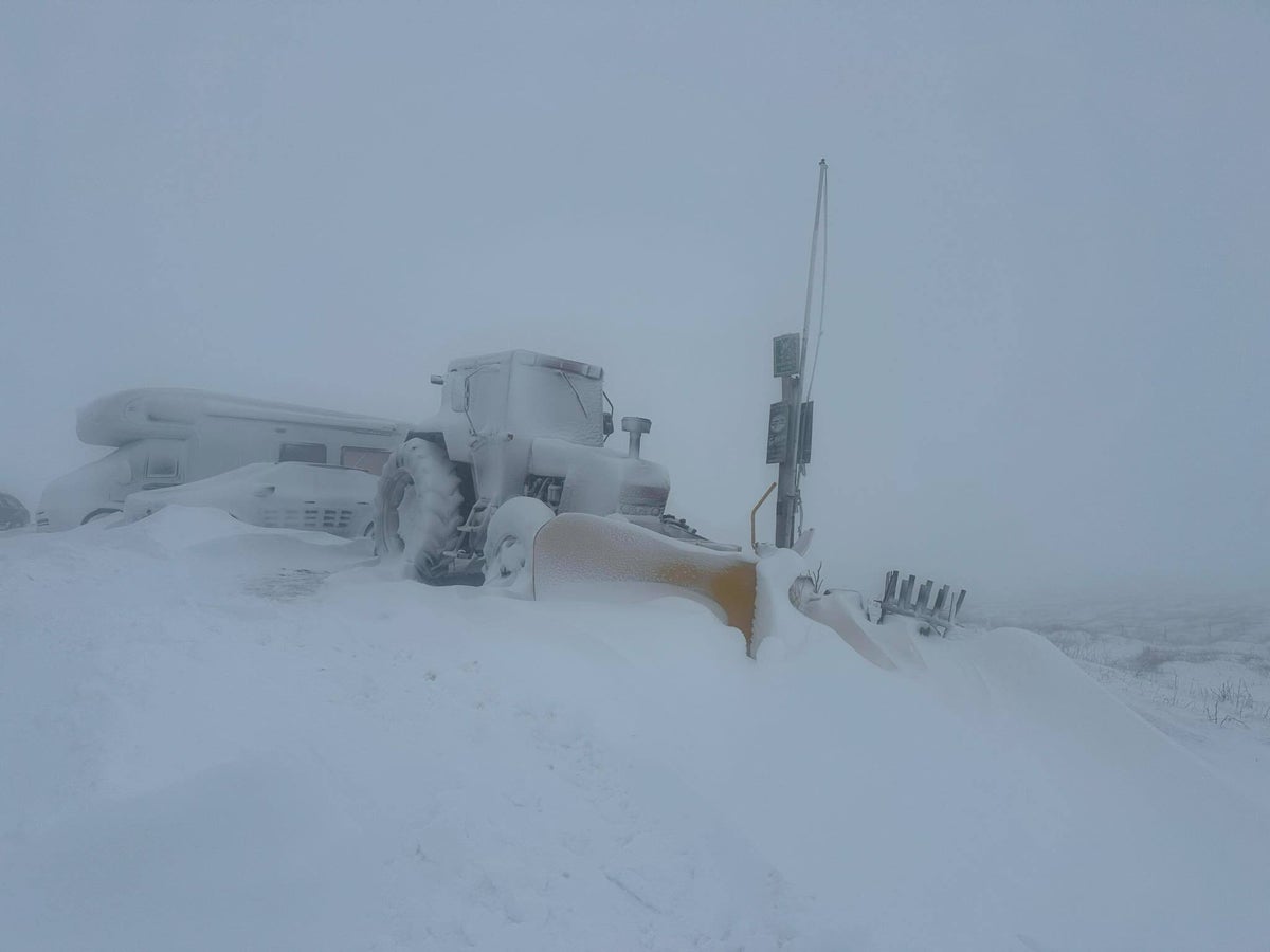 Dozens of people snowed in a Britain’s highest pub