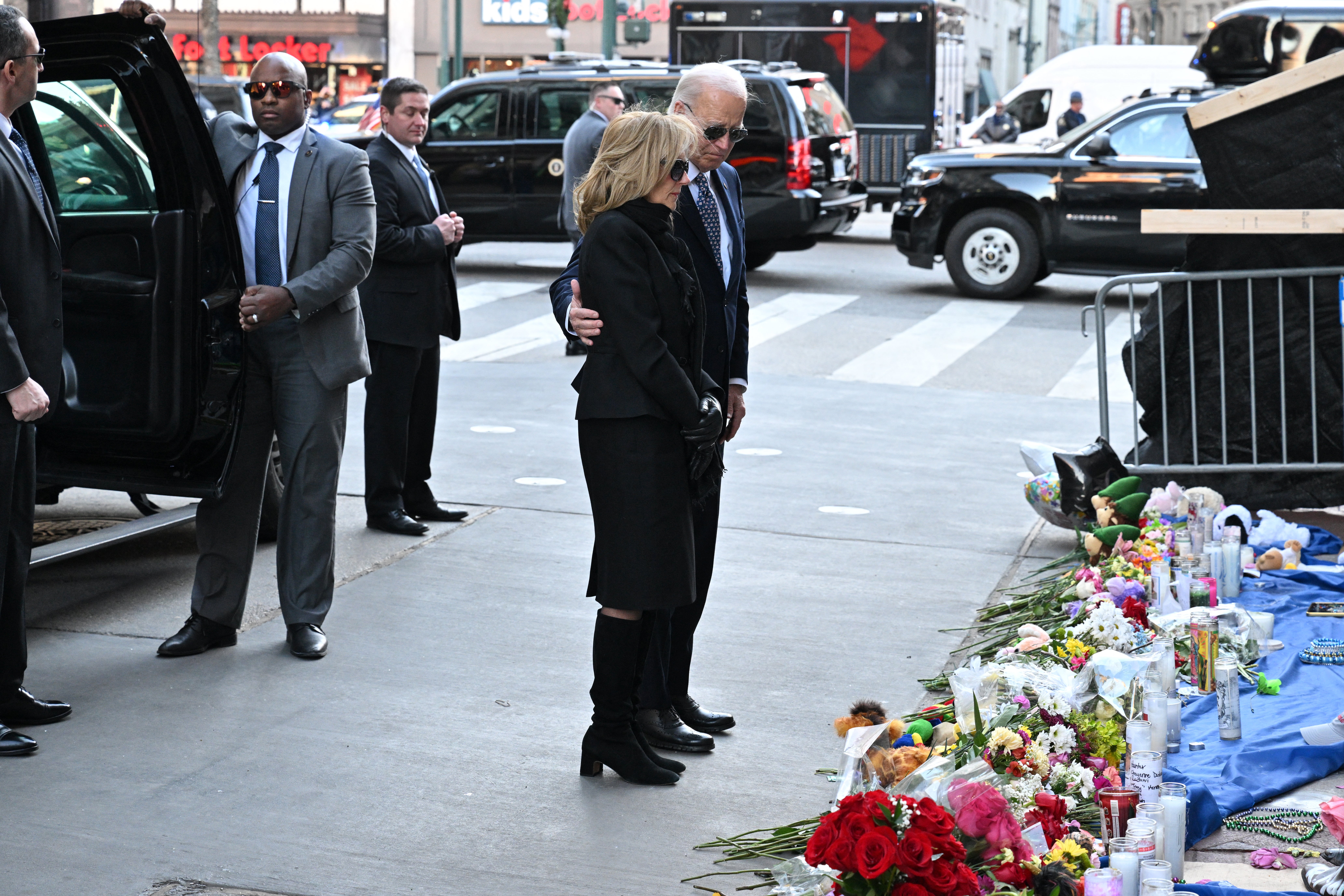 President Joe Biden and First Lady Jill Biden pay their respects to victims of the January 1 truck attack at a makeshift memorial in Bourbon Street in New Orleans, Louisiana