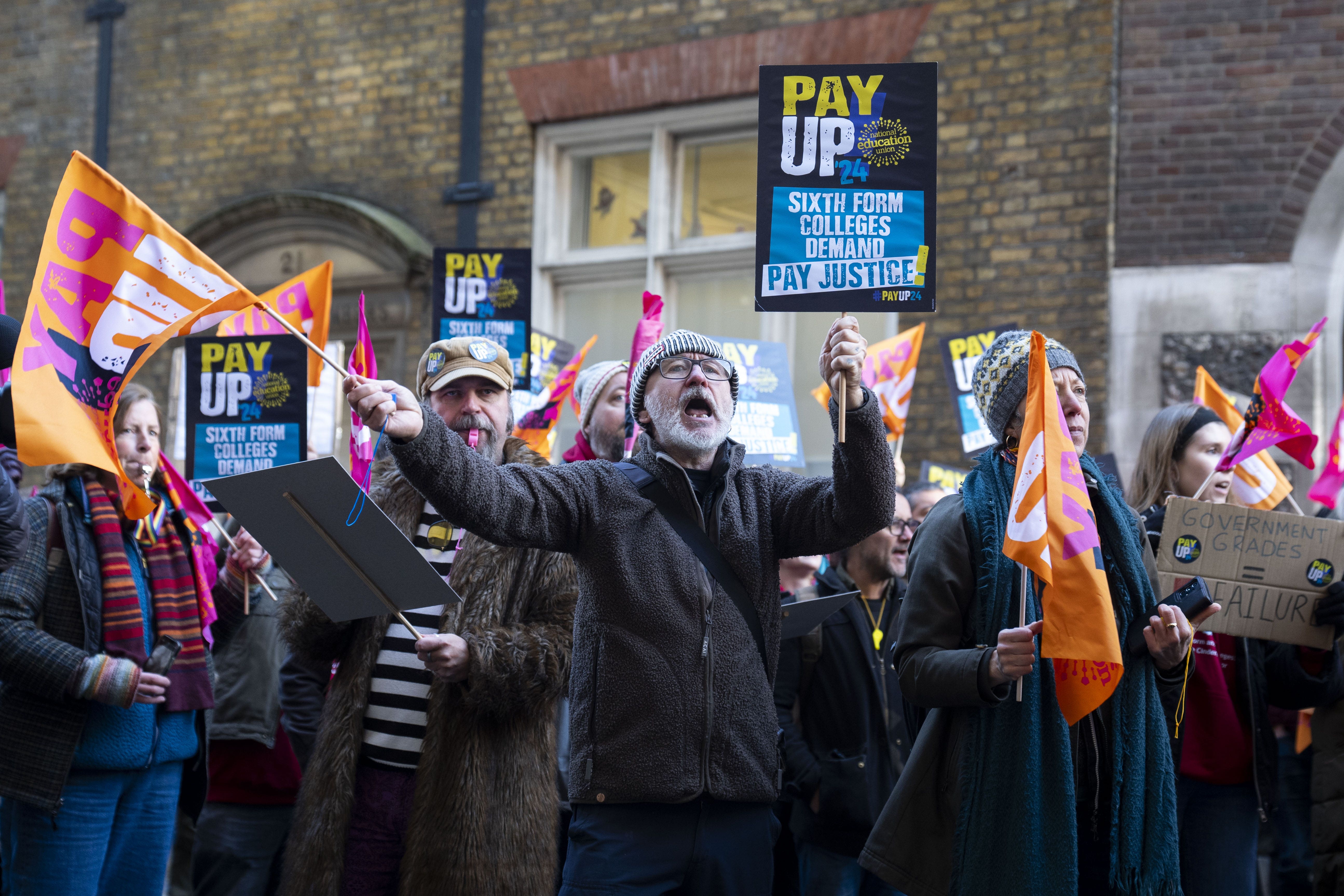 Members of the National Education Union hold a rally outside the Department for Education in London in November (Ben Whitley/PA)
