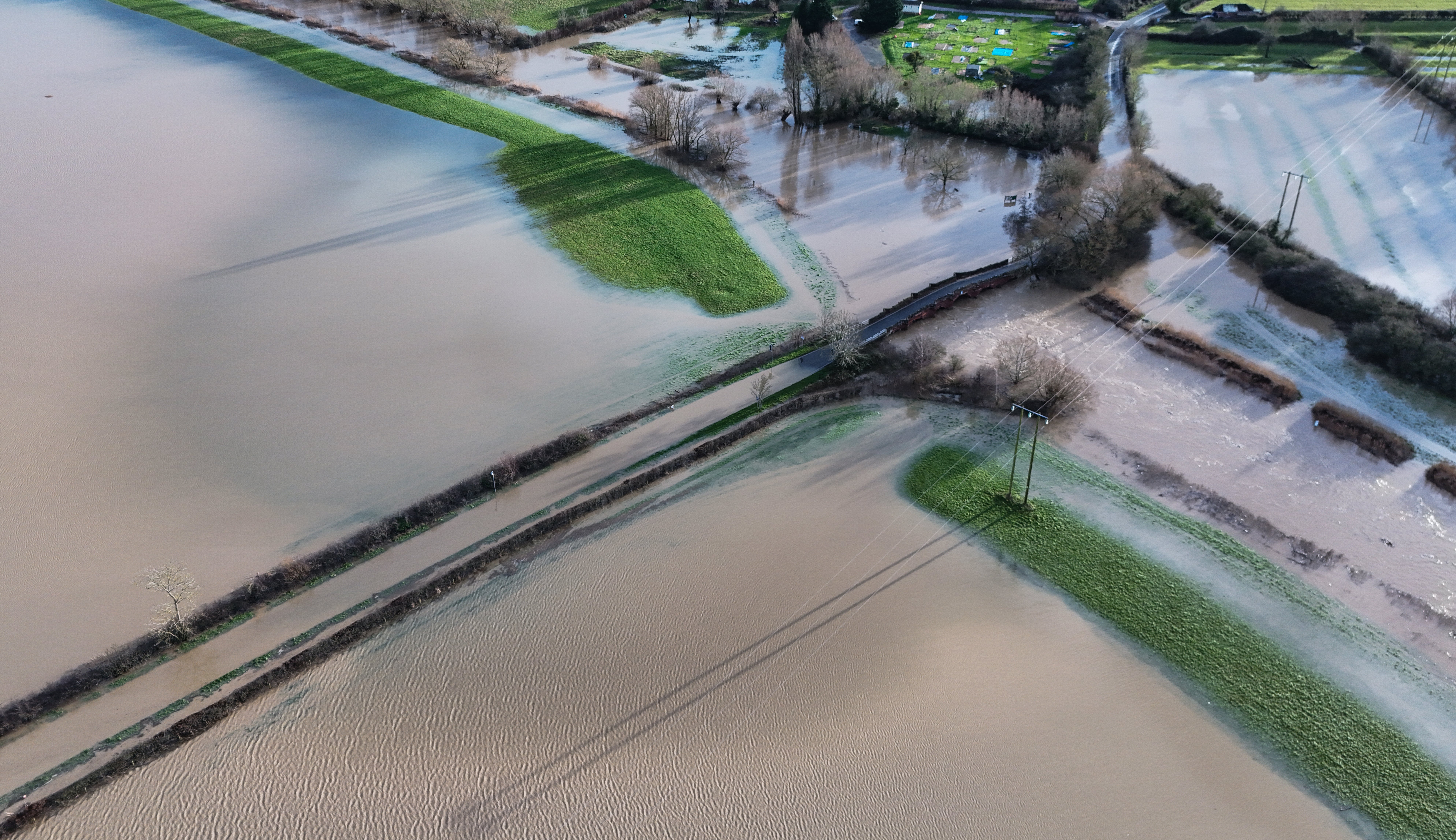 Eckington Bridge in Worcestershire is surrounded by flood water after the River Avon burst its banks