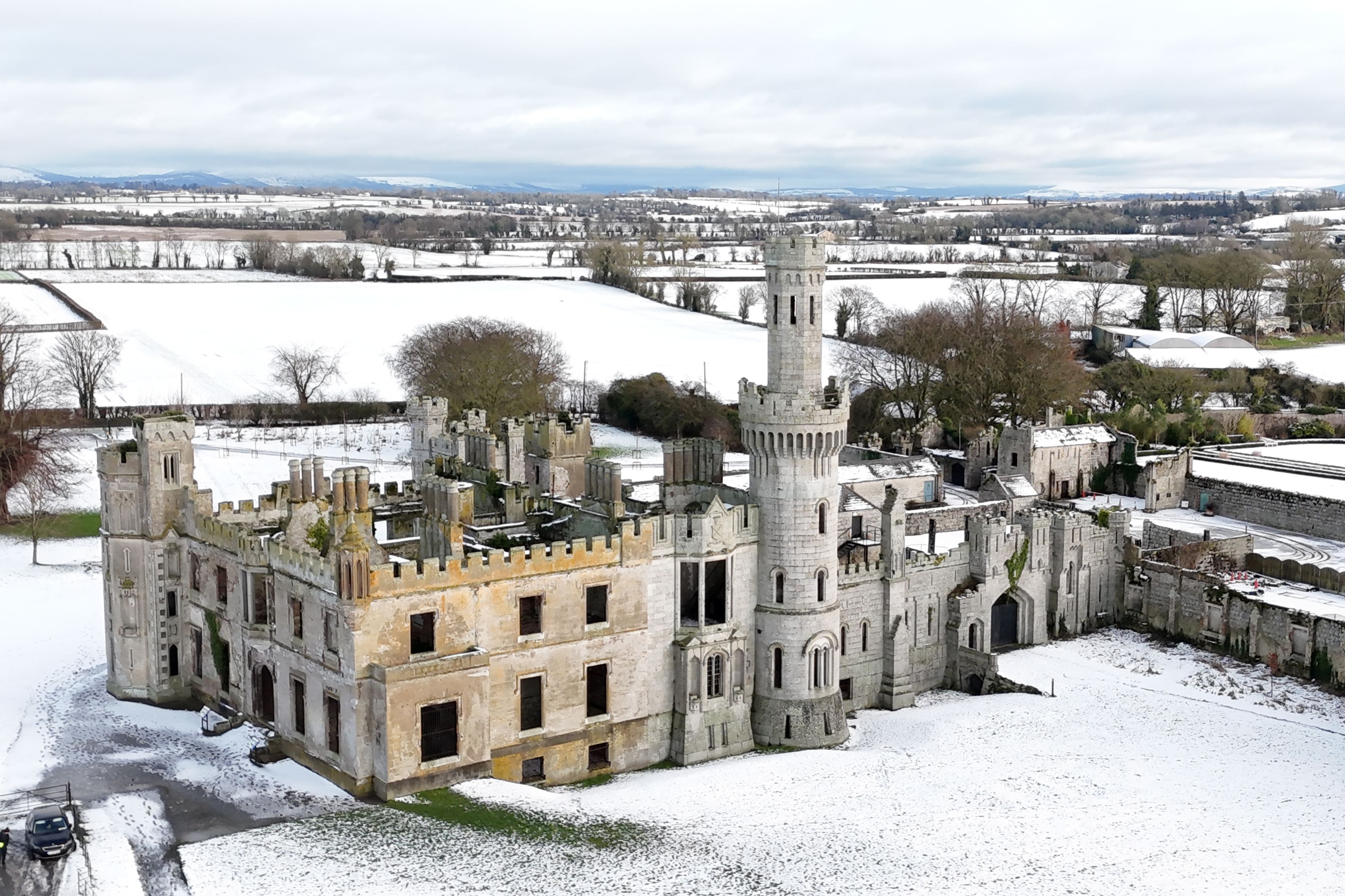 Snow surrounds Duckett’s Grove in Co Carlow (Niall Carson/PA)