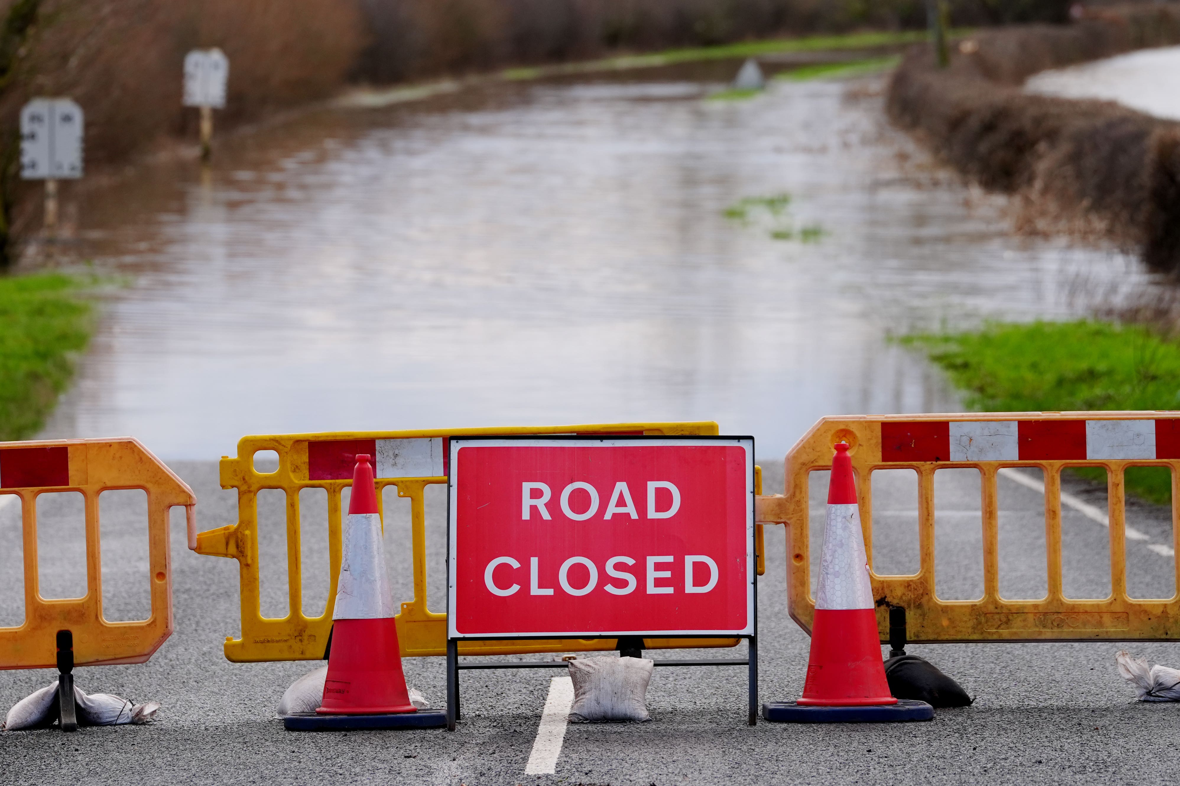 Severe flooding and snow are causing travel disruption as weather warnings remain in force (David Davies/PA)