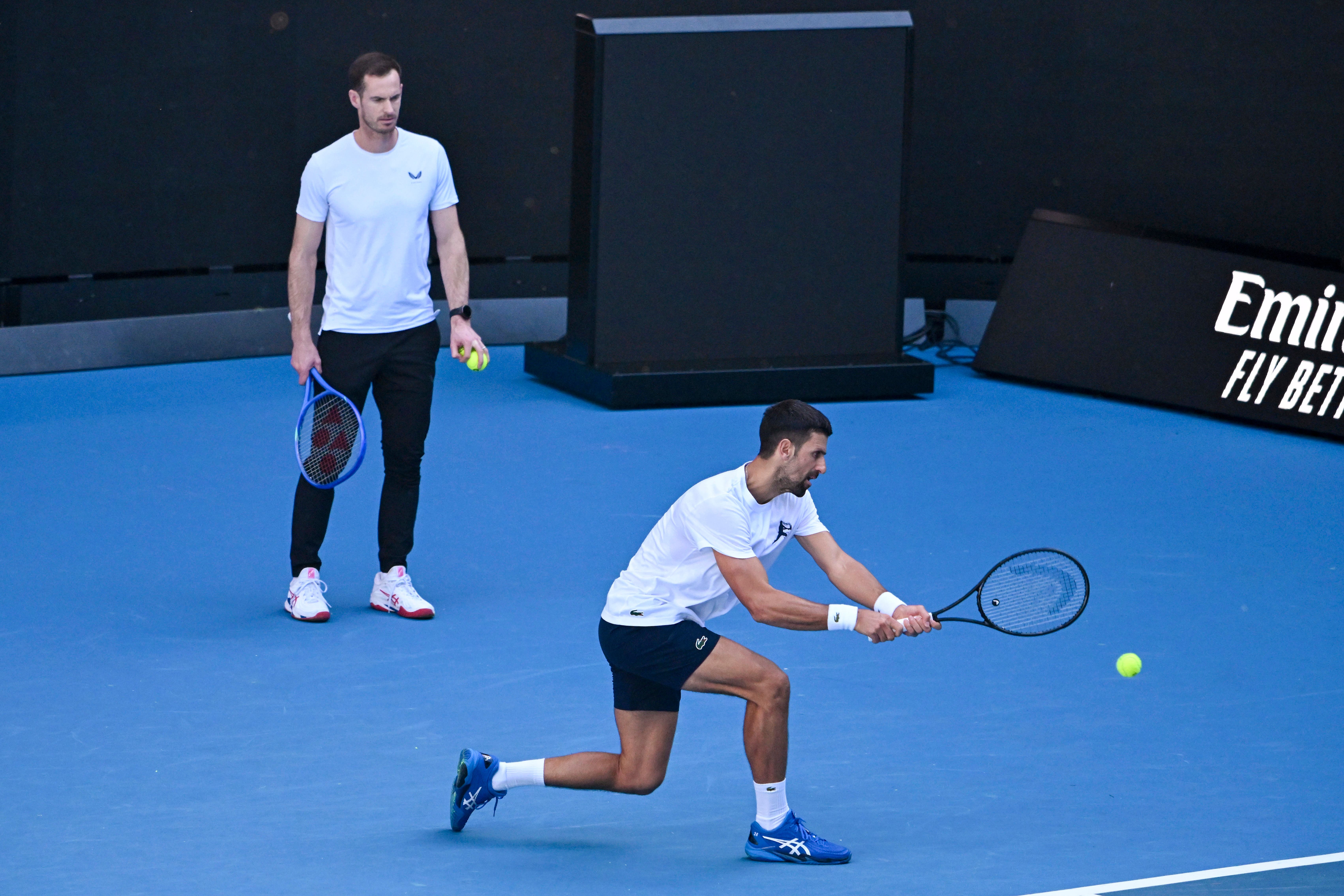 Andy Murray (left) kept a close eye on Novak Djokovic from the baseline at Margaret Court Arena (James Ross/AAP Image via AP)