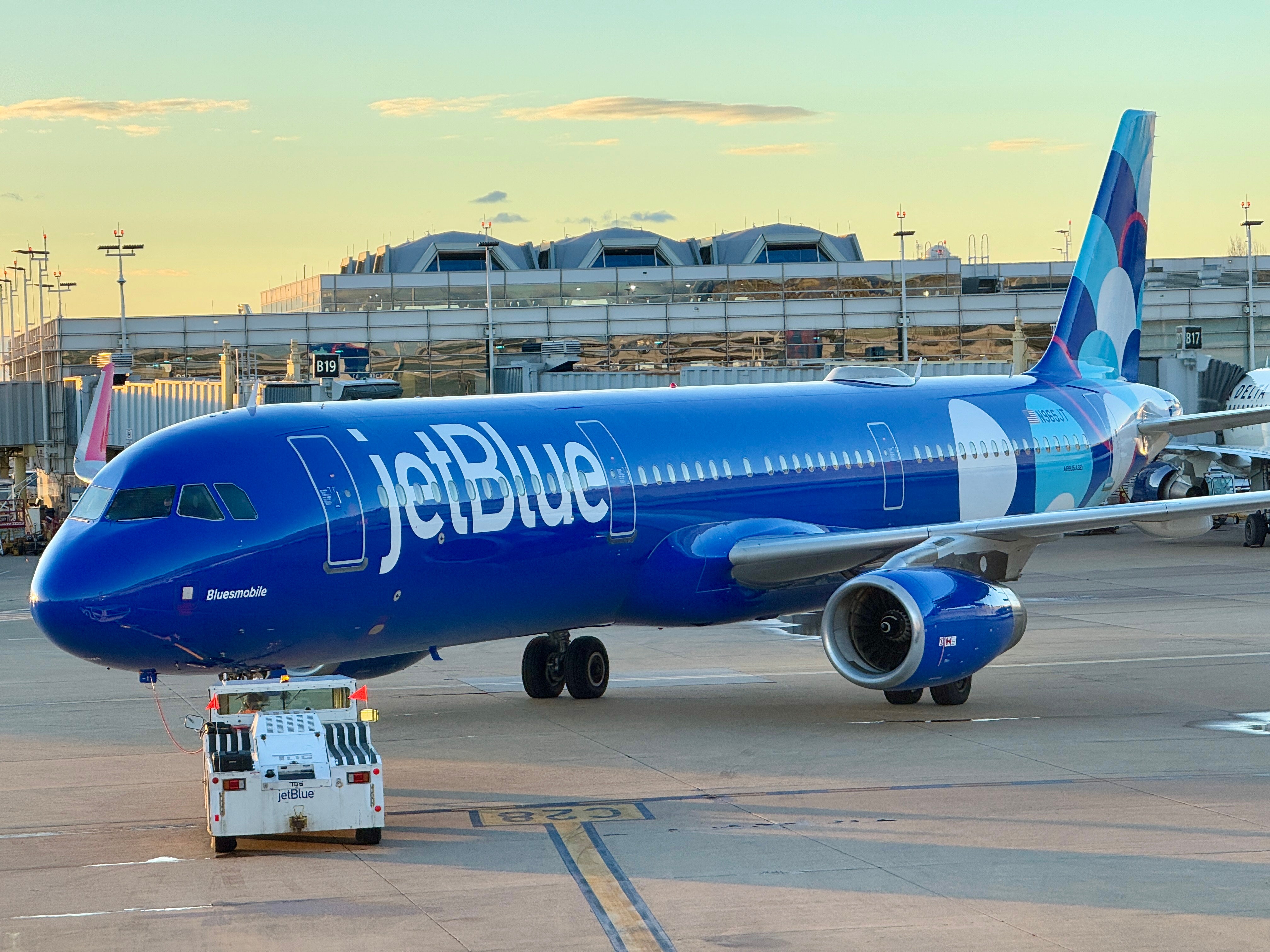 A pair of men who climbed into the wheel bay of a Jet Blue aircraft were found dead by airport staff in Fort Lauderdale, Florida