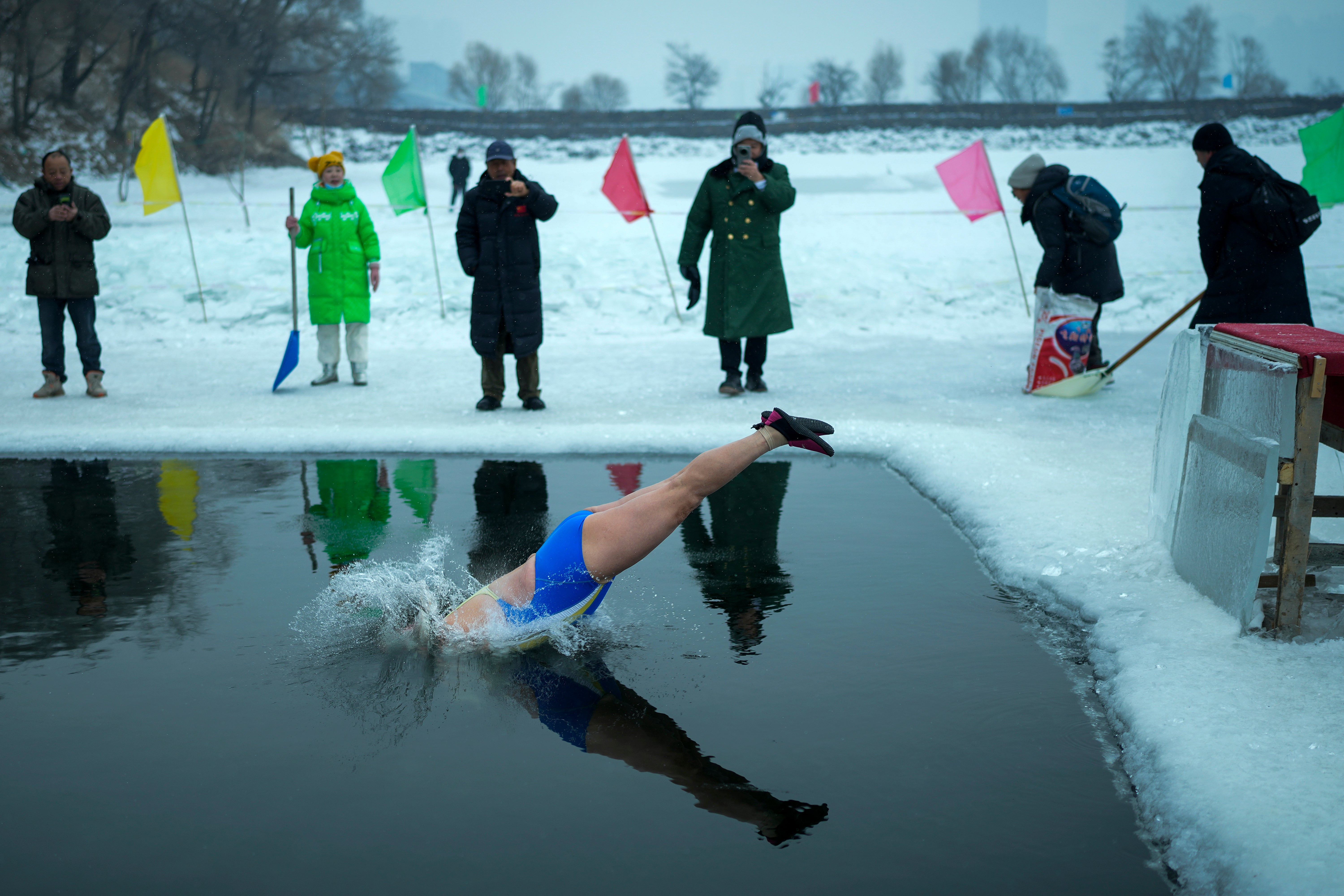 APTOPIX China Winter Swimming