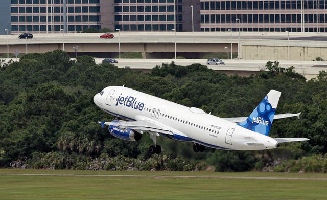 <p>A man on a JetBlue flight  </p>