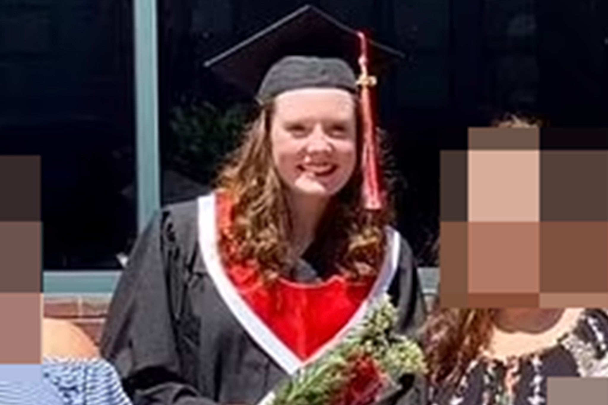 Neonatal nurse Erin Strotman, 26, of Chesterfield County, (pictured at her graduation in 2019) has been charged and booked with malicious wounding and felony child abuse