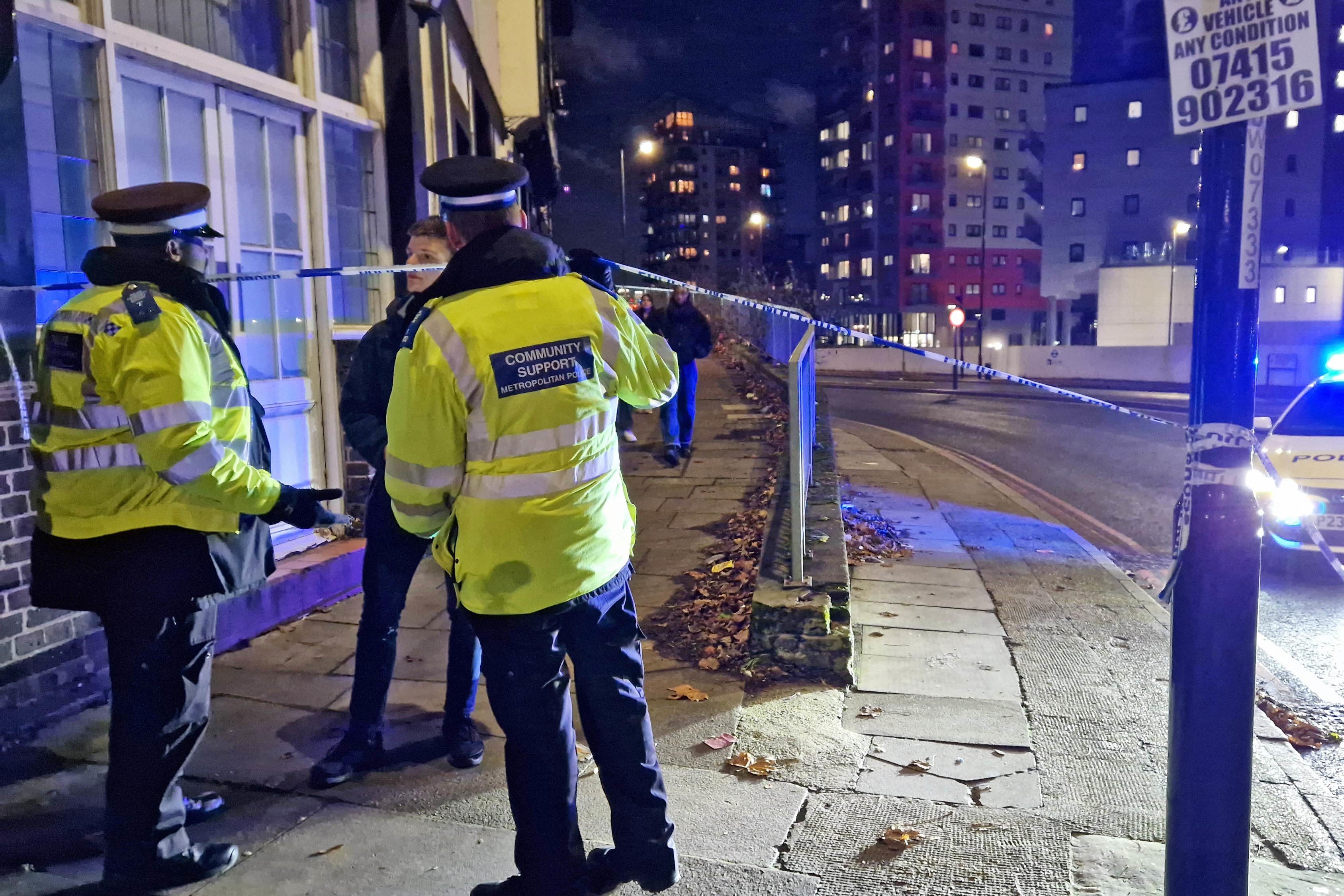 Police at the scene in Woolwich, south east London where a 14-year-old boy died after he was stabbed on a bus (Ben Bauer/PA)