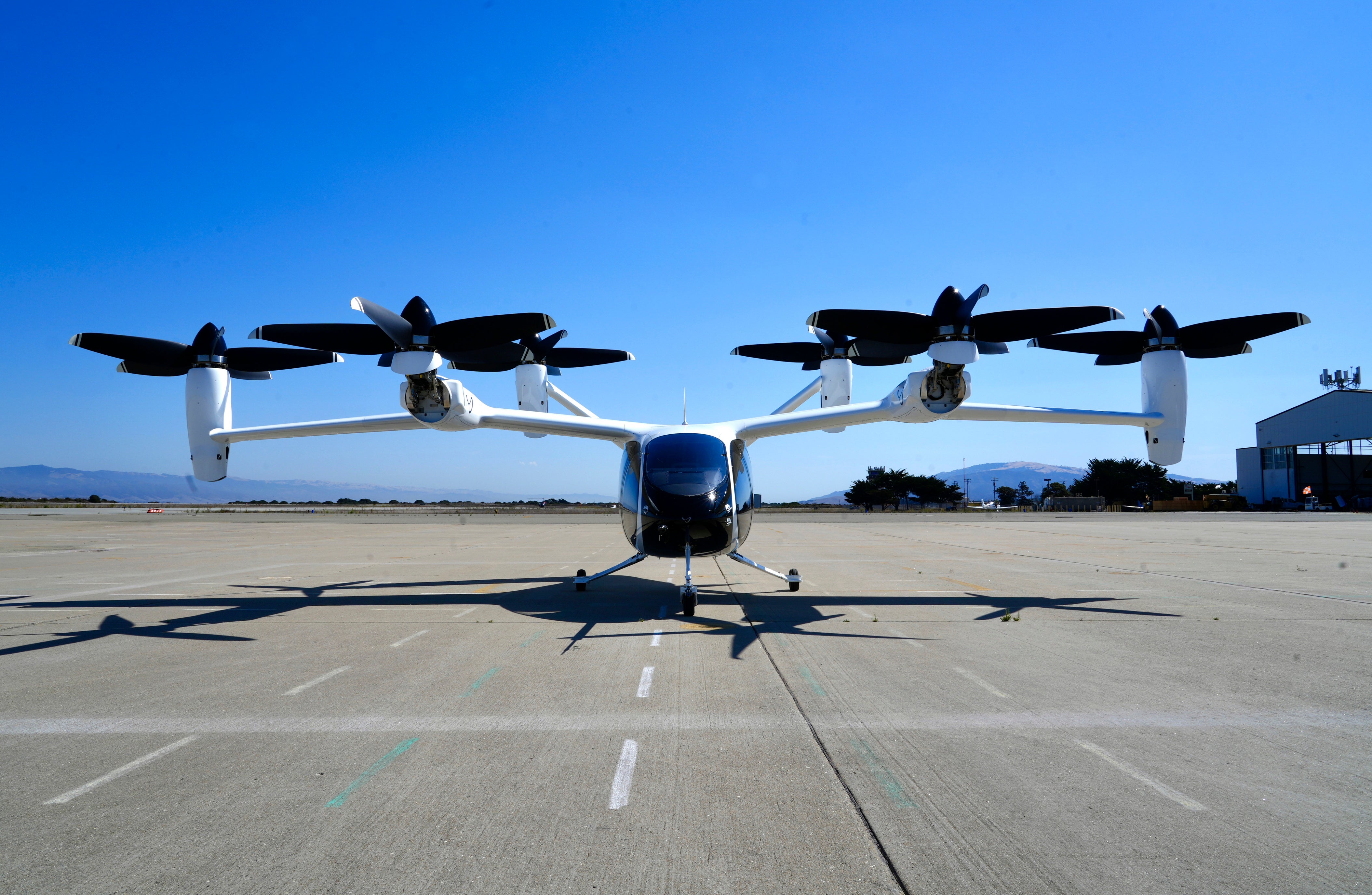 An ‘electric vertical take-off and landing’ aircraft built by Joby Aviation is parked at an airfield in Marina