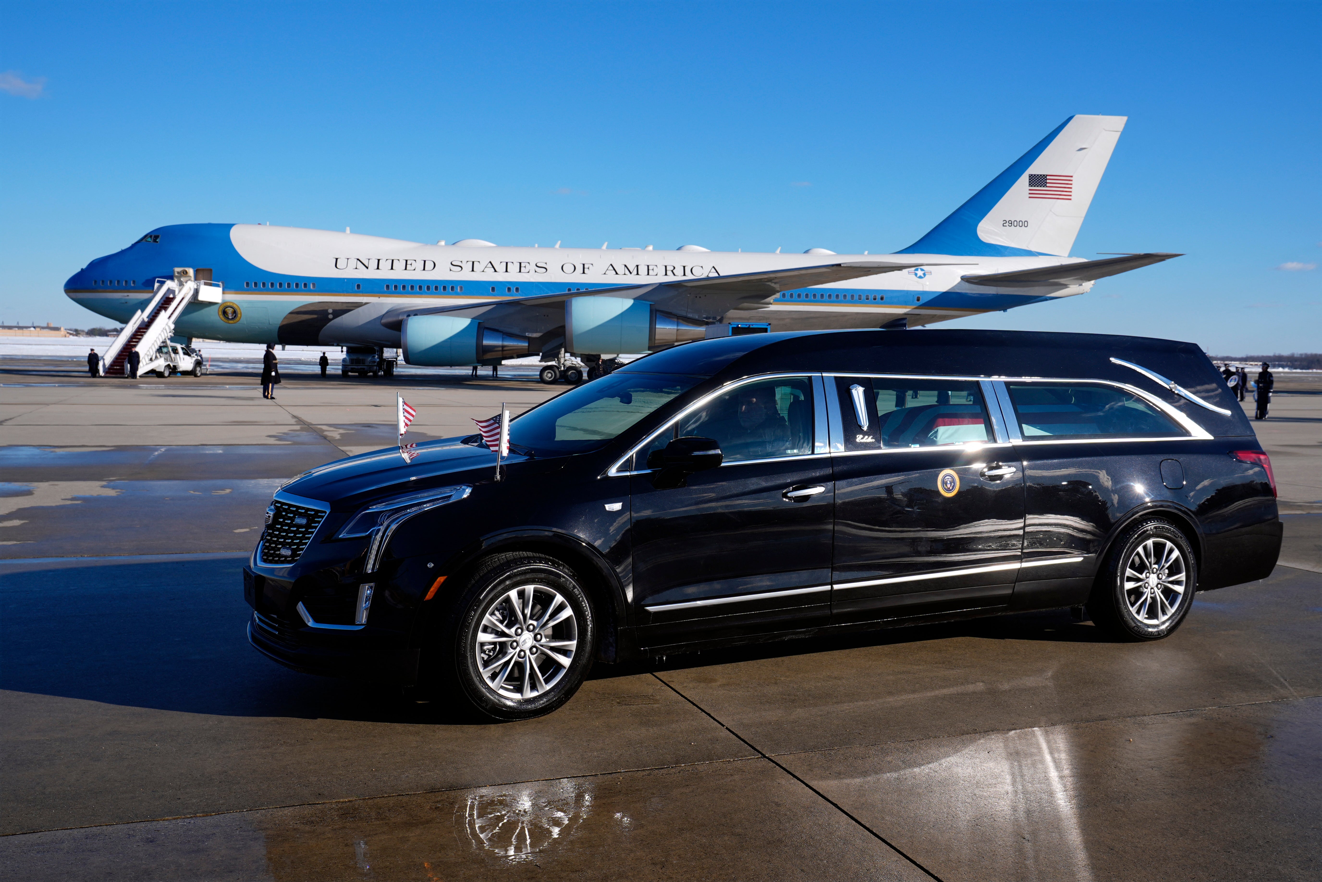 The hearse carrying the flag-draped casket of former President Jimmy Carter prepares to depart Joint Base Andrews, Maryland on January 7, 2025.