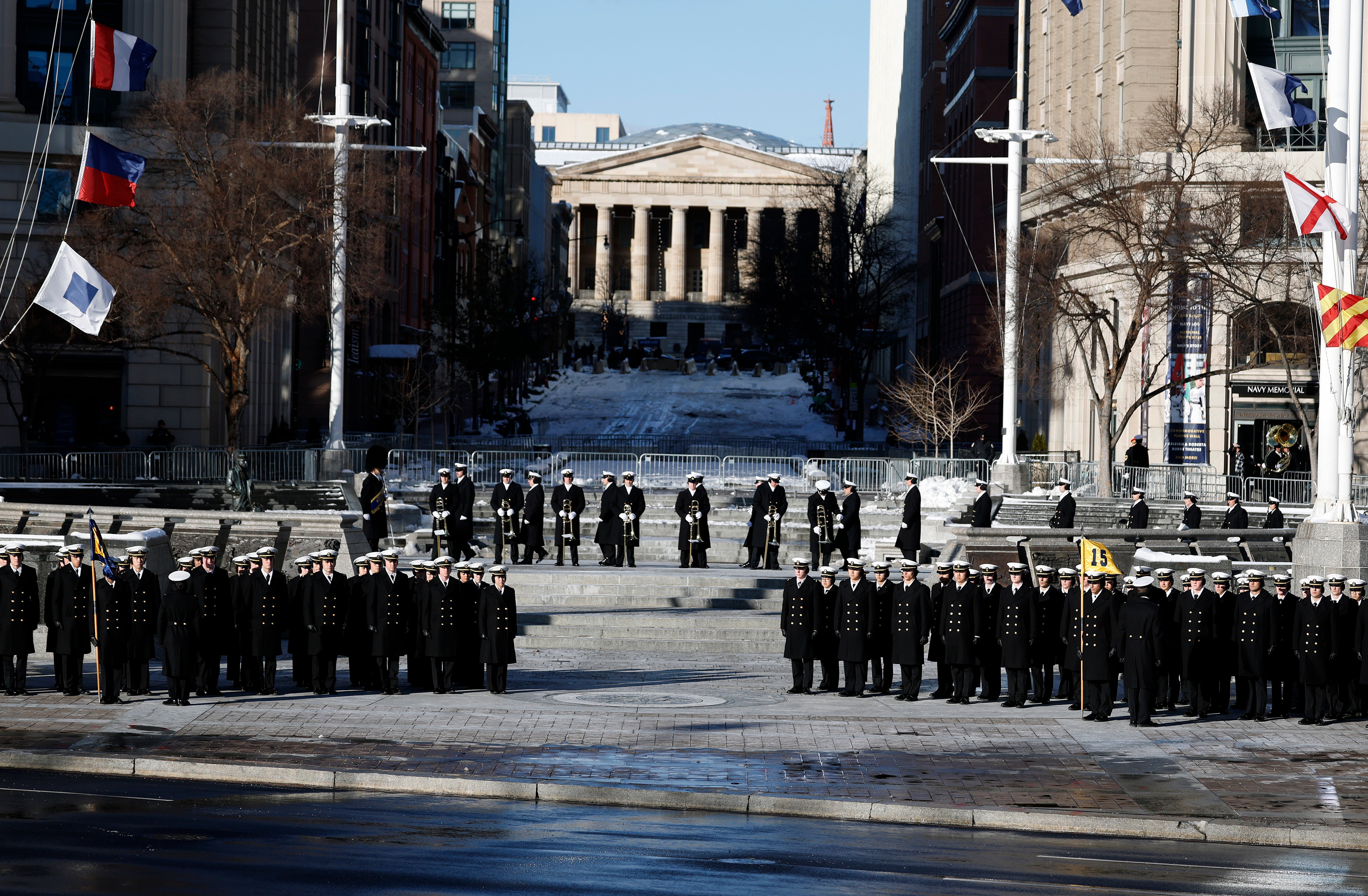 Members of the U.S. Navy await the casket of former U.S. President Jimmy Carter for a stop at the U.S. Navy Memorial before traveling to the U.S. Capitol on January 07, 2025 in Washington, DC