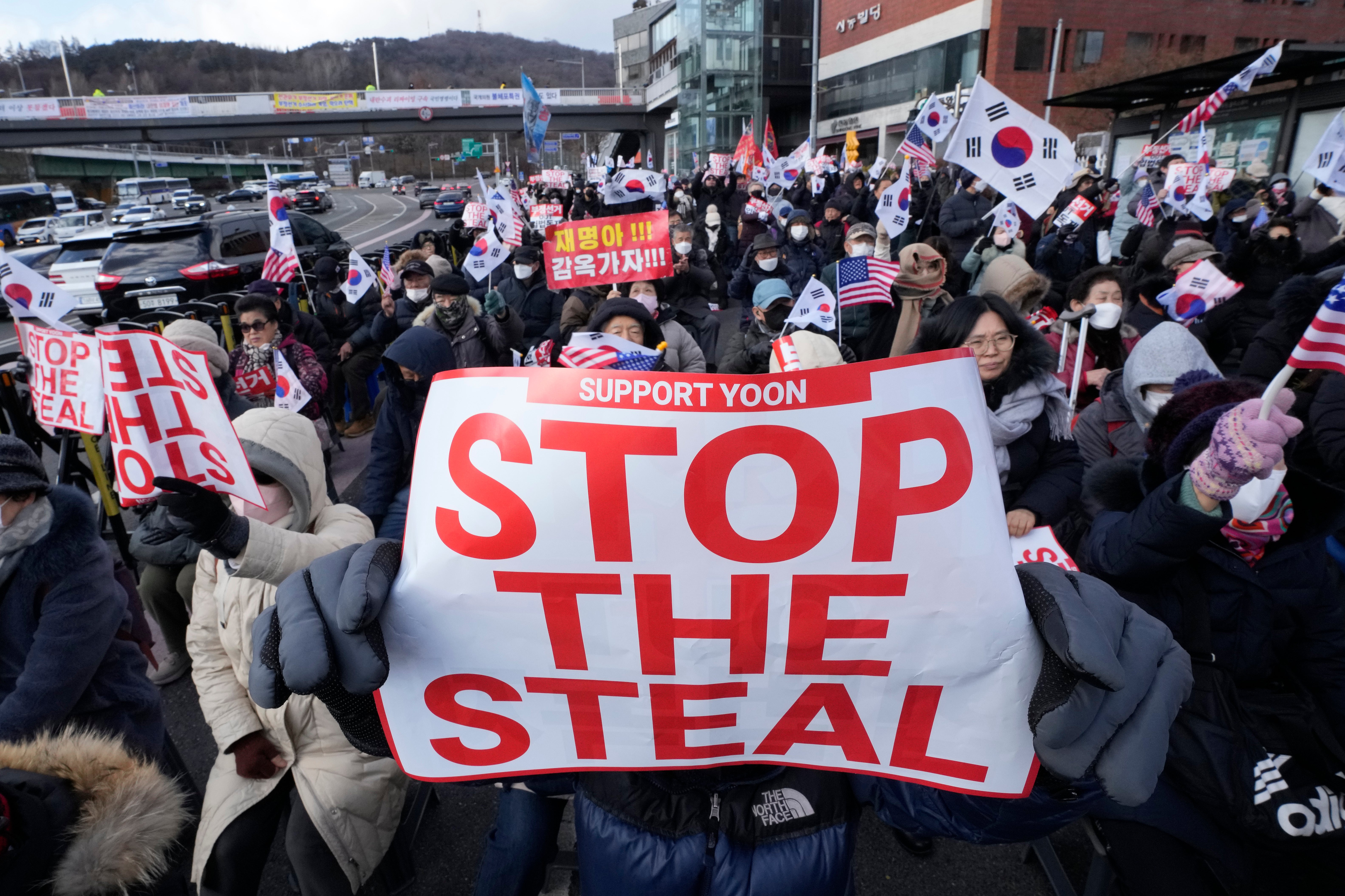 Supporters of impeached South Korean president Yoon Suk Yeol stage a rally to oppose his impeachment