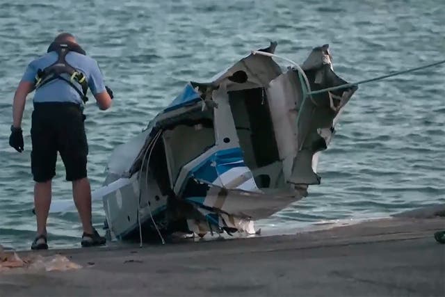 <p>Australian police recover wreckage of the seaplane</p>