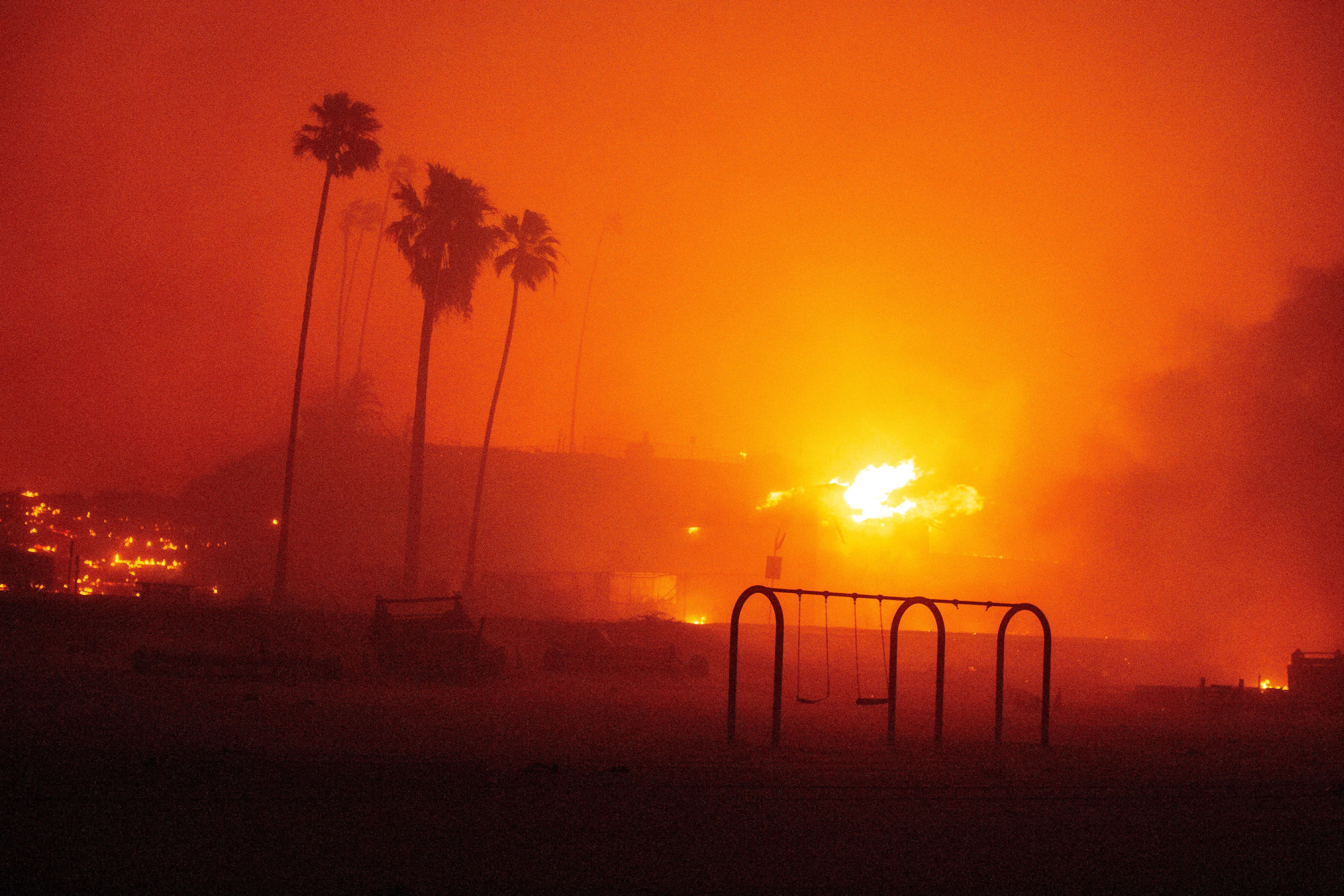 Palisades Fire burns during a windstorm on the west side of Los Angeles