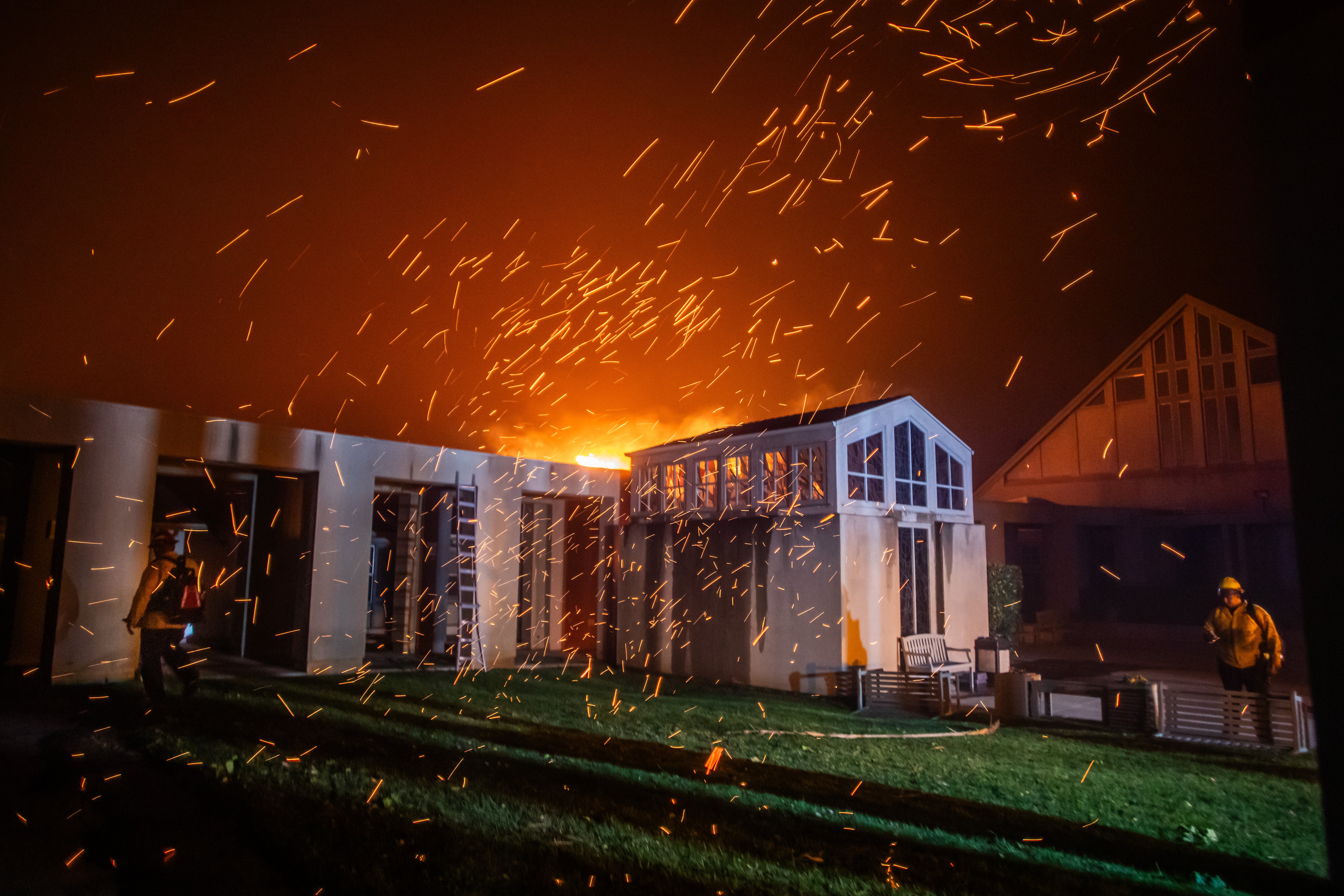 Firefighters surround the Pacific Palisades Presbyterian Church during a powerful windstorm on January 8. Gavin Newsom, the state’s governor, declared a state of emergency Tuesday. President Joe Biden has offered federal assistance to suppress the fires and said that FEMA approved a grant to support areas that are impacted and help reimburse California for firefighting costs.