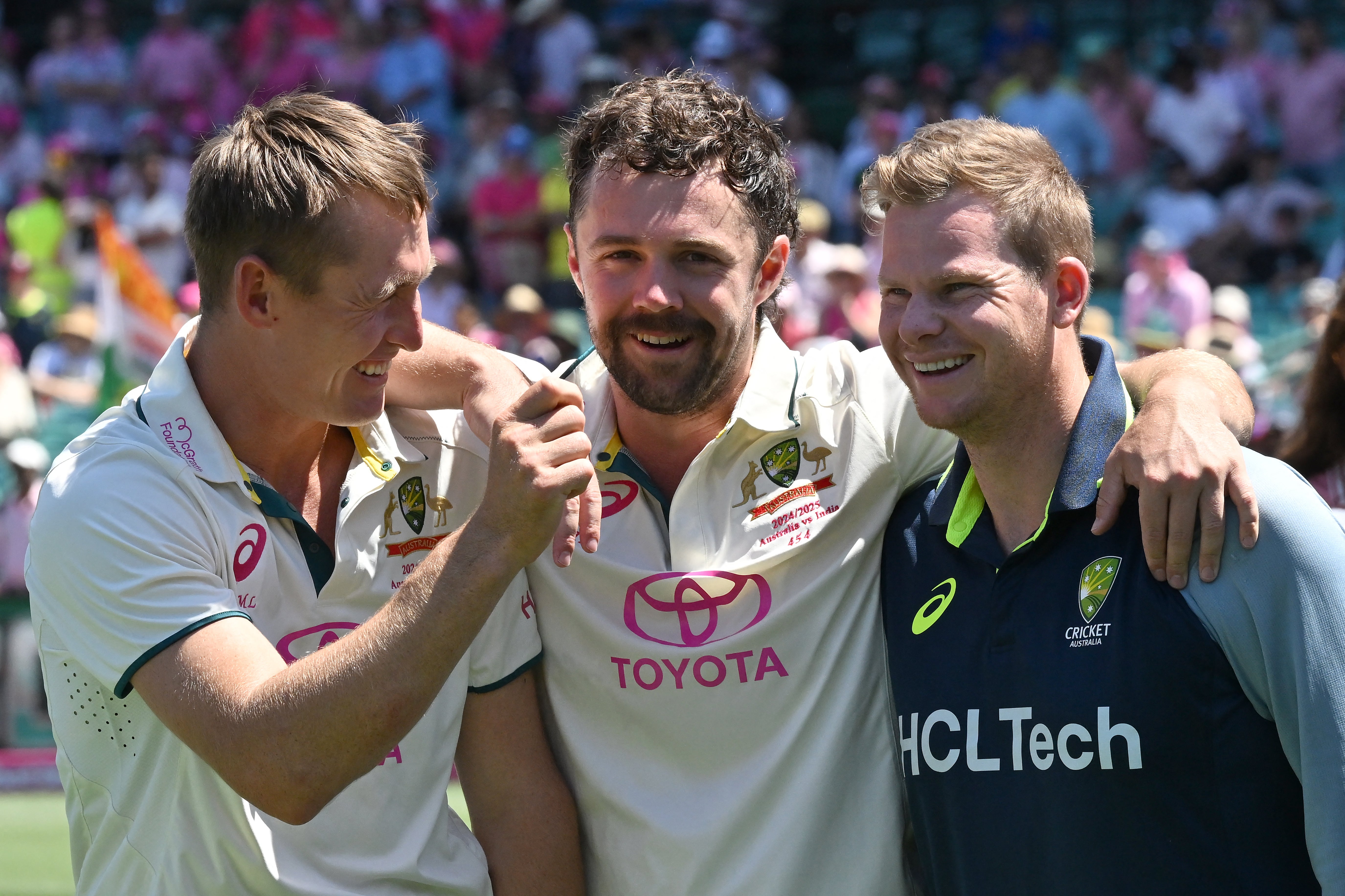 Australia’s players, Marnus Labuschagne (L), Travis Head and Steve Smith (R), chat during the presentation ceremony