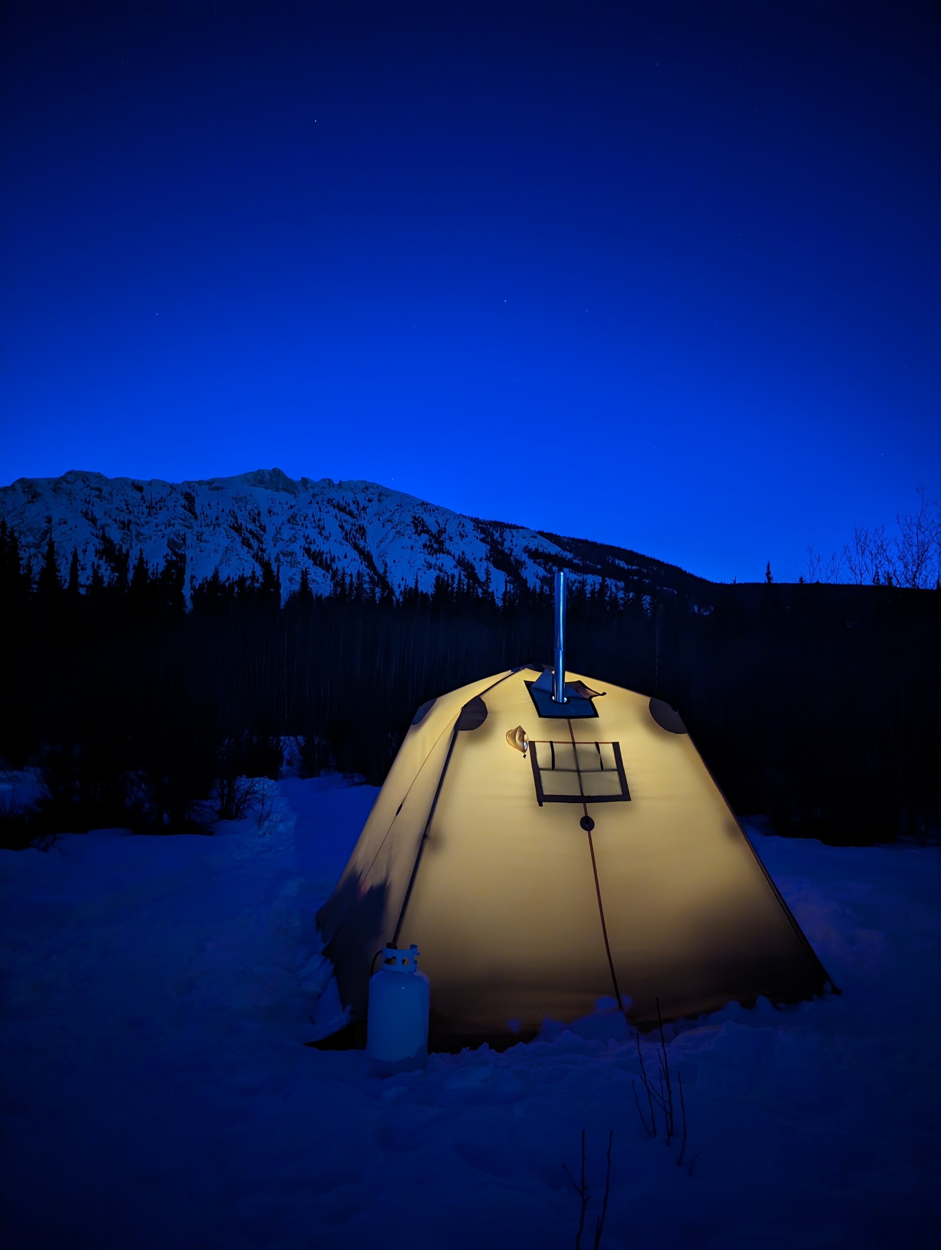 Propane-heated Arctic Oven tents protect campers from the cold