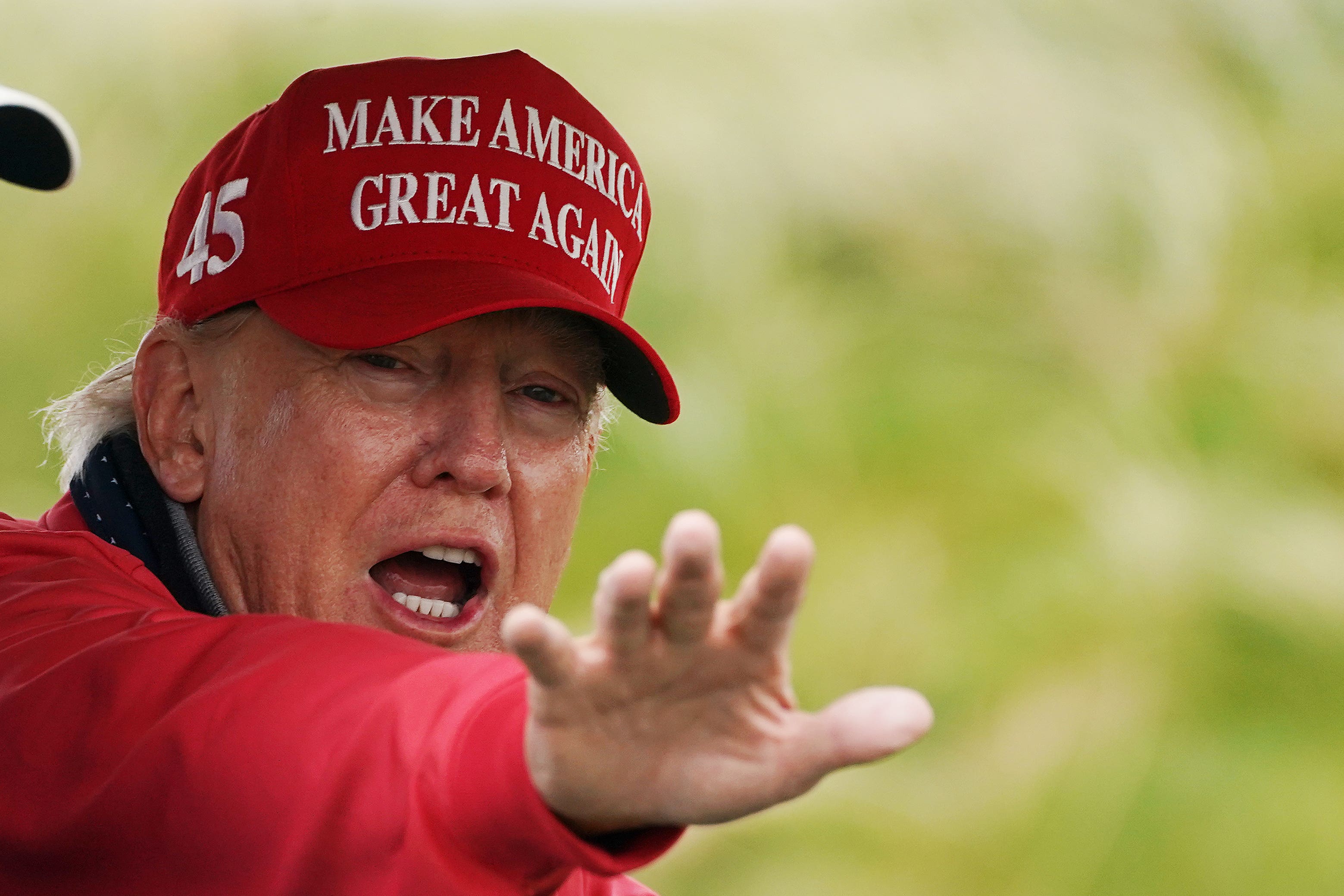 Former US president Donald Trump on the 4th hole at Trump International Golf Links & Hotel in Doonbeg, Co. Clare, during his visit to Ireland (Brian Lawless/PA)