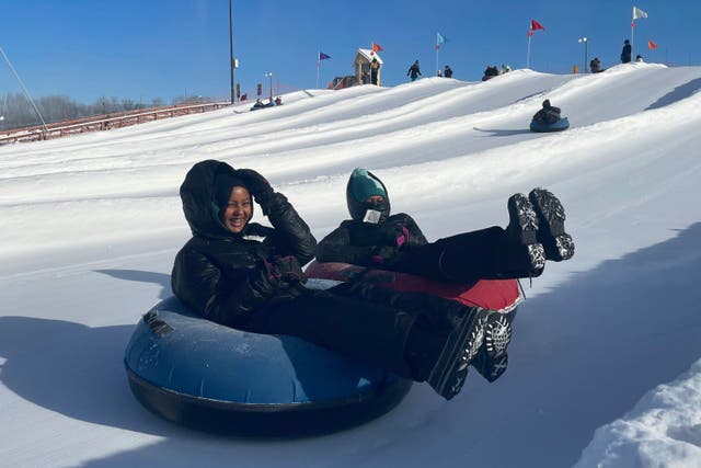 Snow Tubing in Hijabs