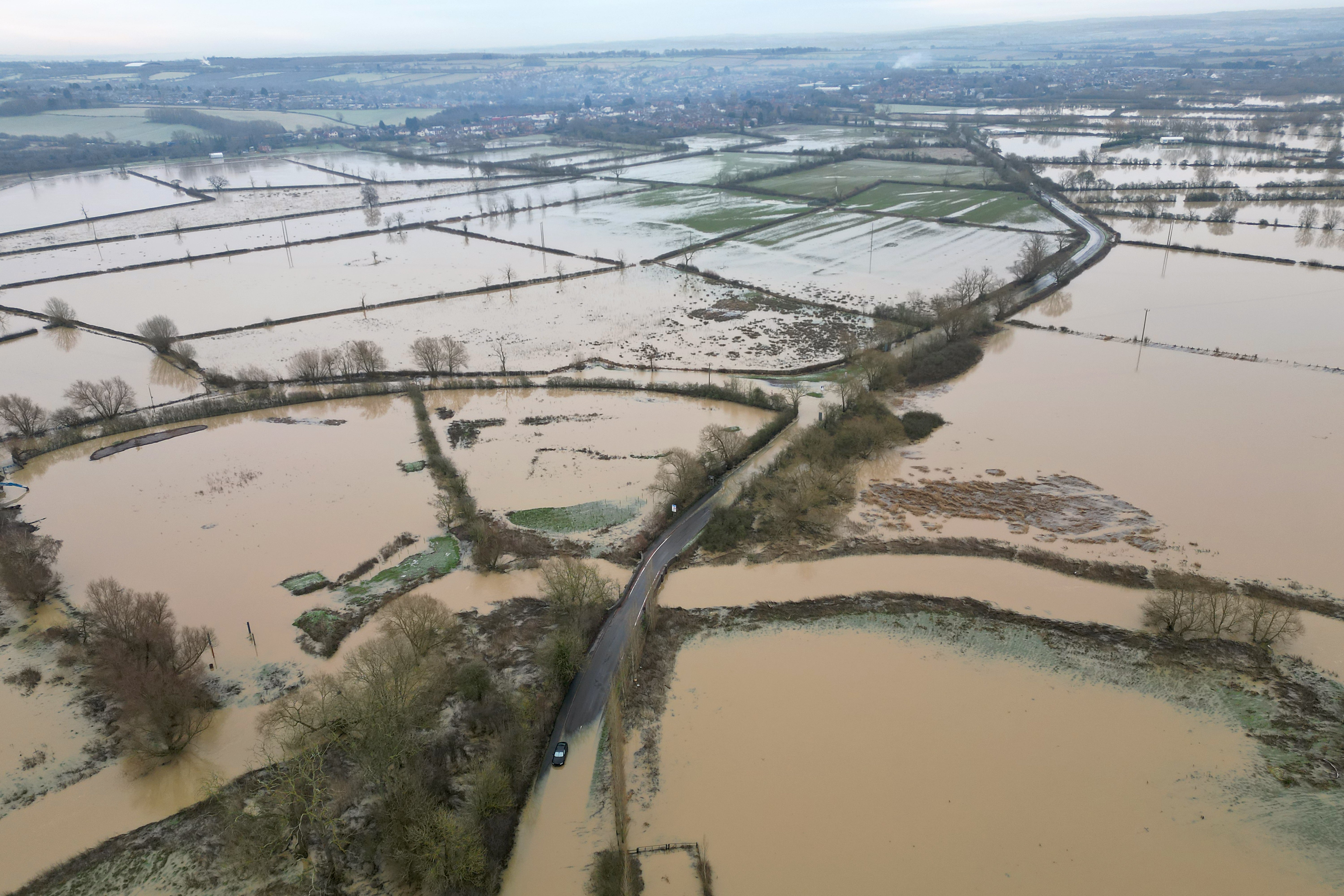 An abandoned car on a flooded road in Mountsorrel in Leicestershire