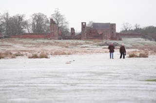 Weather warnings for snow and ice are in force across much of the UK after severe flooding and snow caused travel disruption and school closures