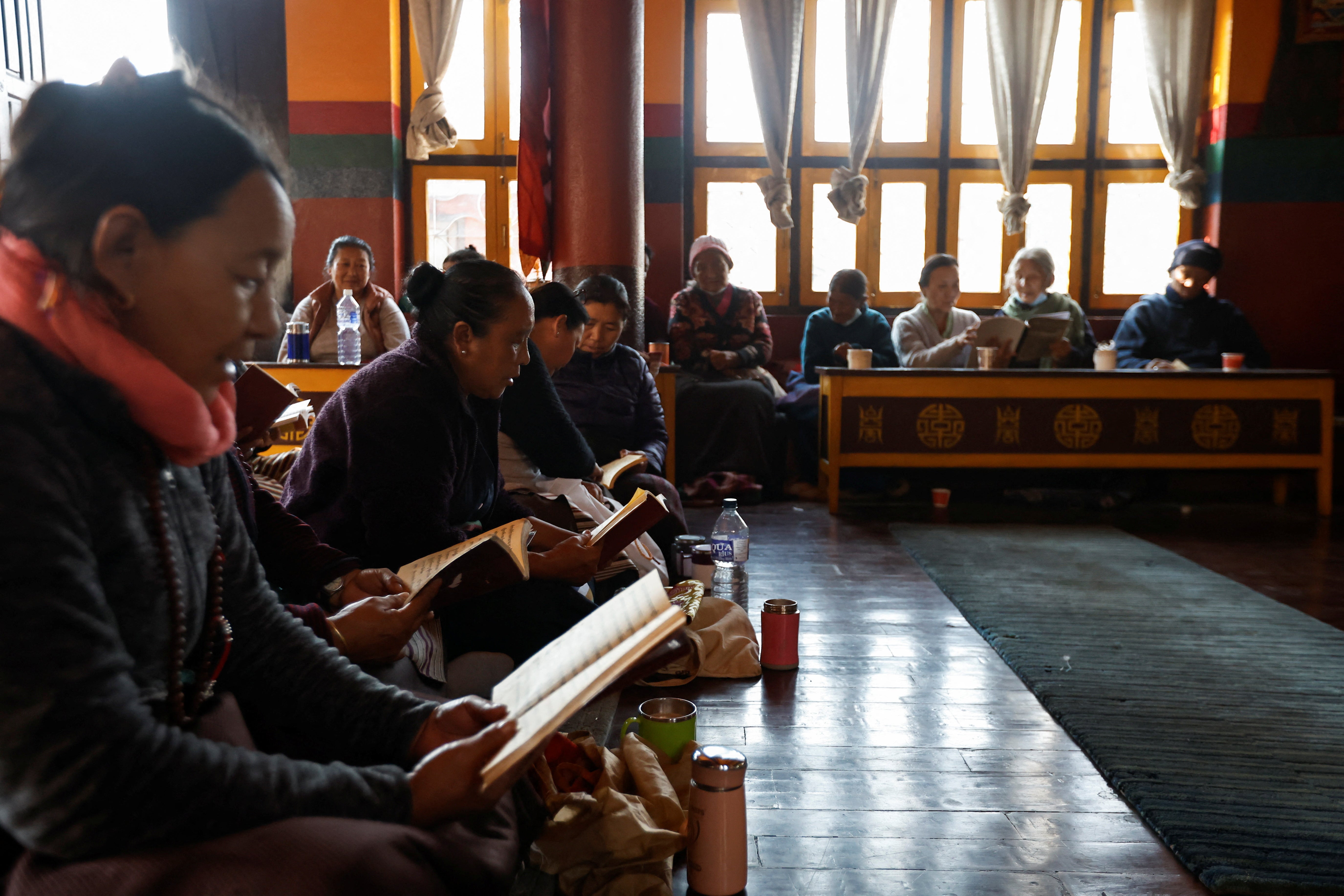 Tibetans in Nepal offer prayers at a monastery in memory of those killed in Tuesday’s earthquake