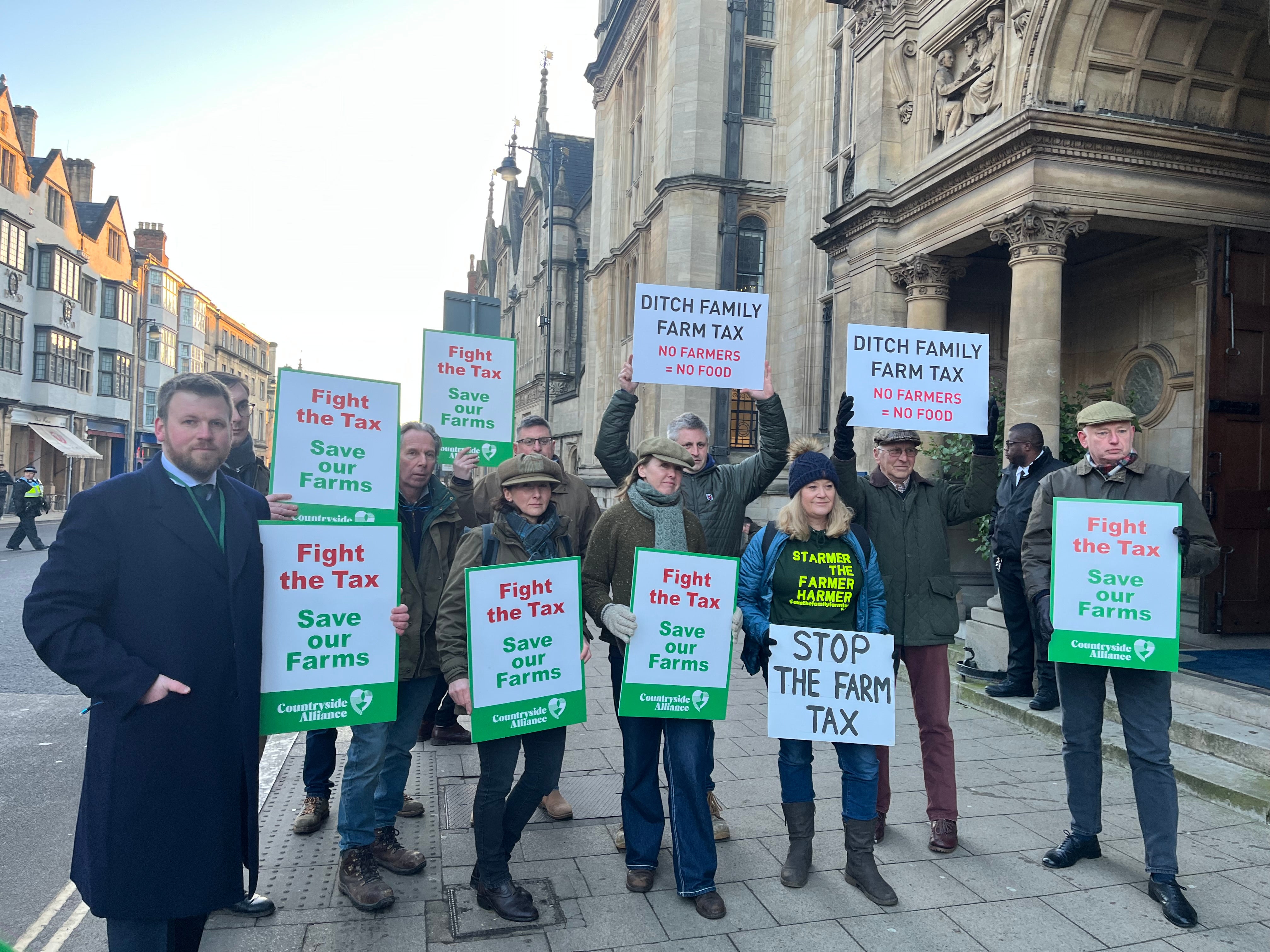 Farmers protest outside the conference