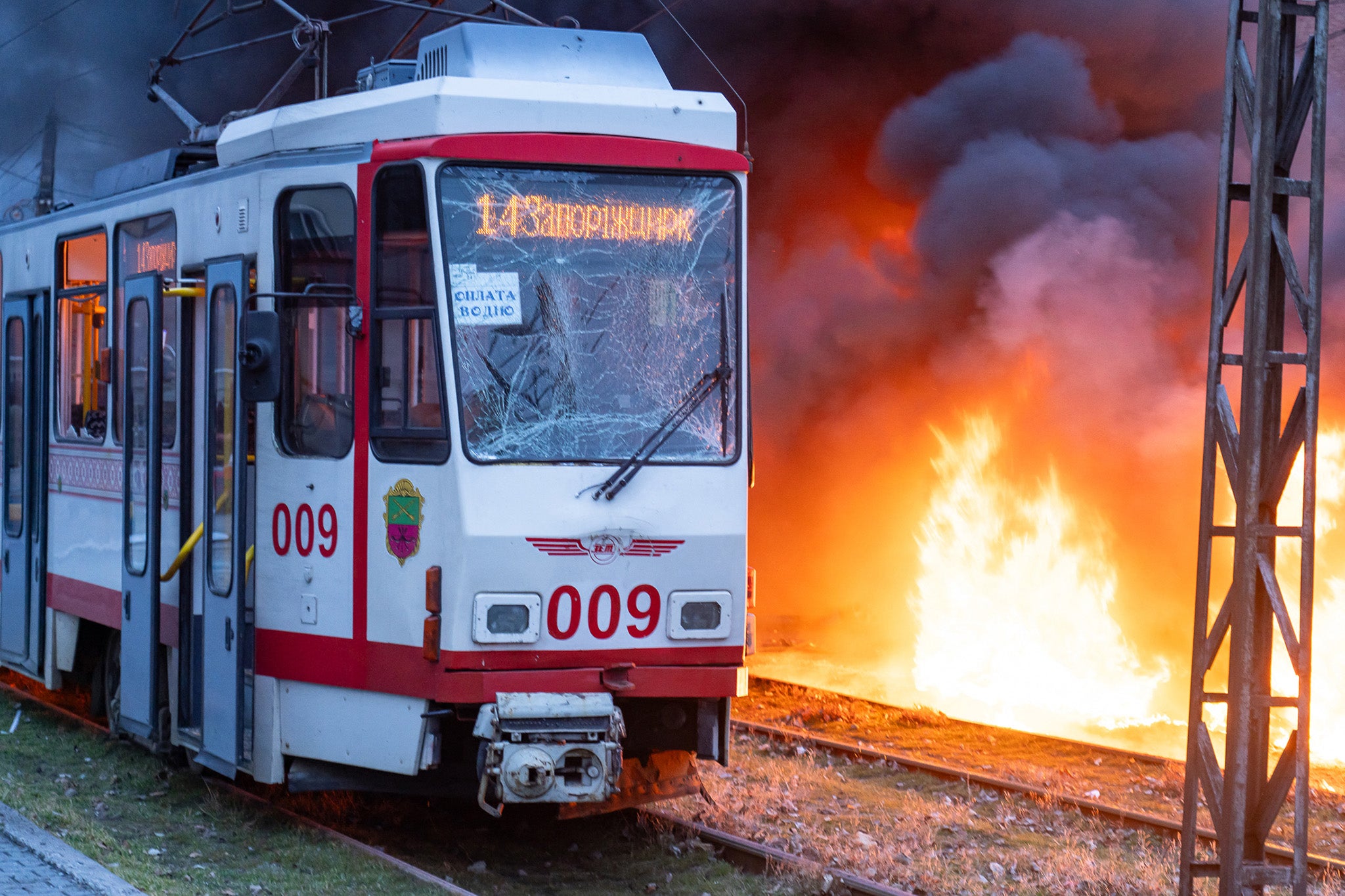 Debris from a Russian glide bomb hit a nearby tram (pictured) filled with civilians on Wednesday