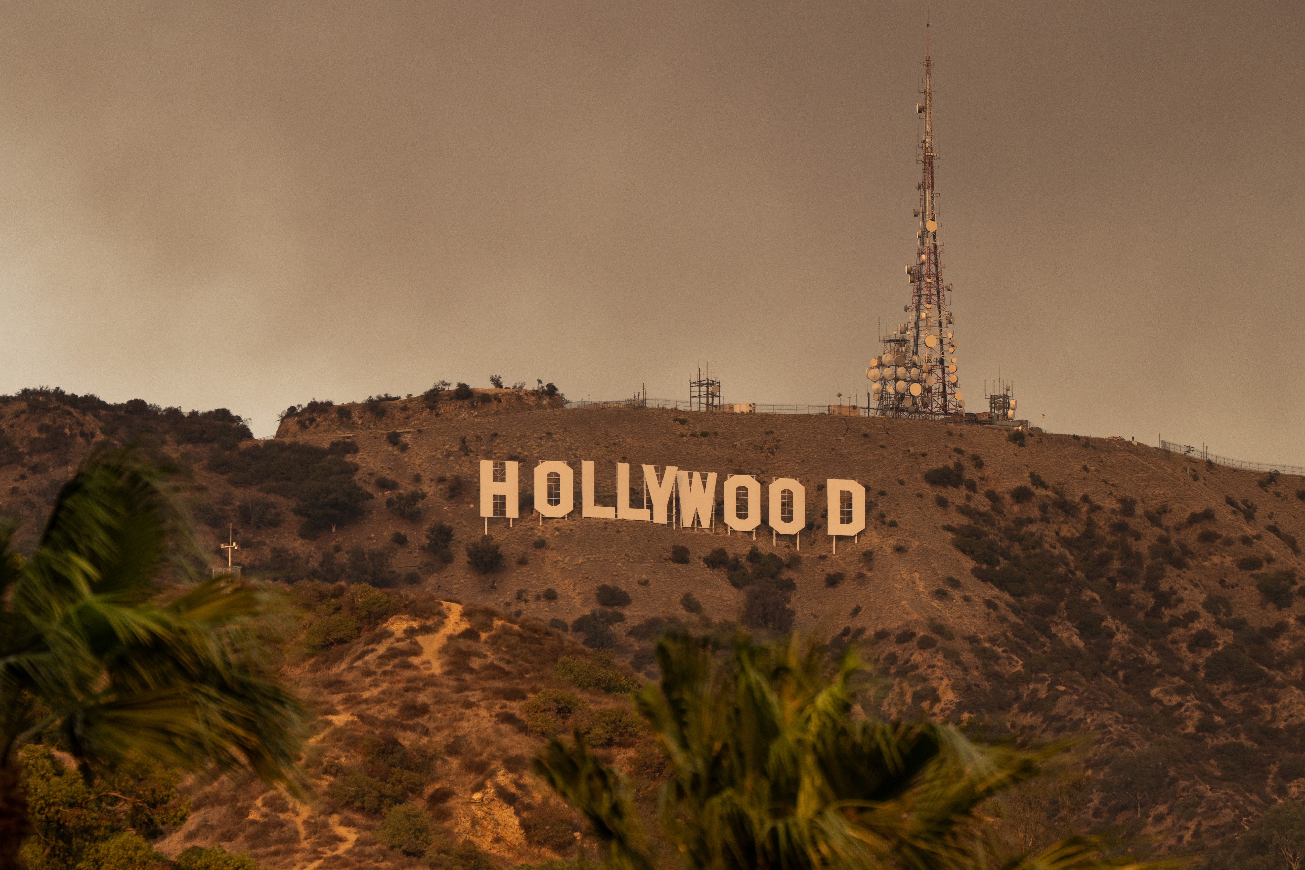 The iconic Hollywood sign showed enveloped in smoke but still standing amid the crisis in Los Angeles