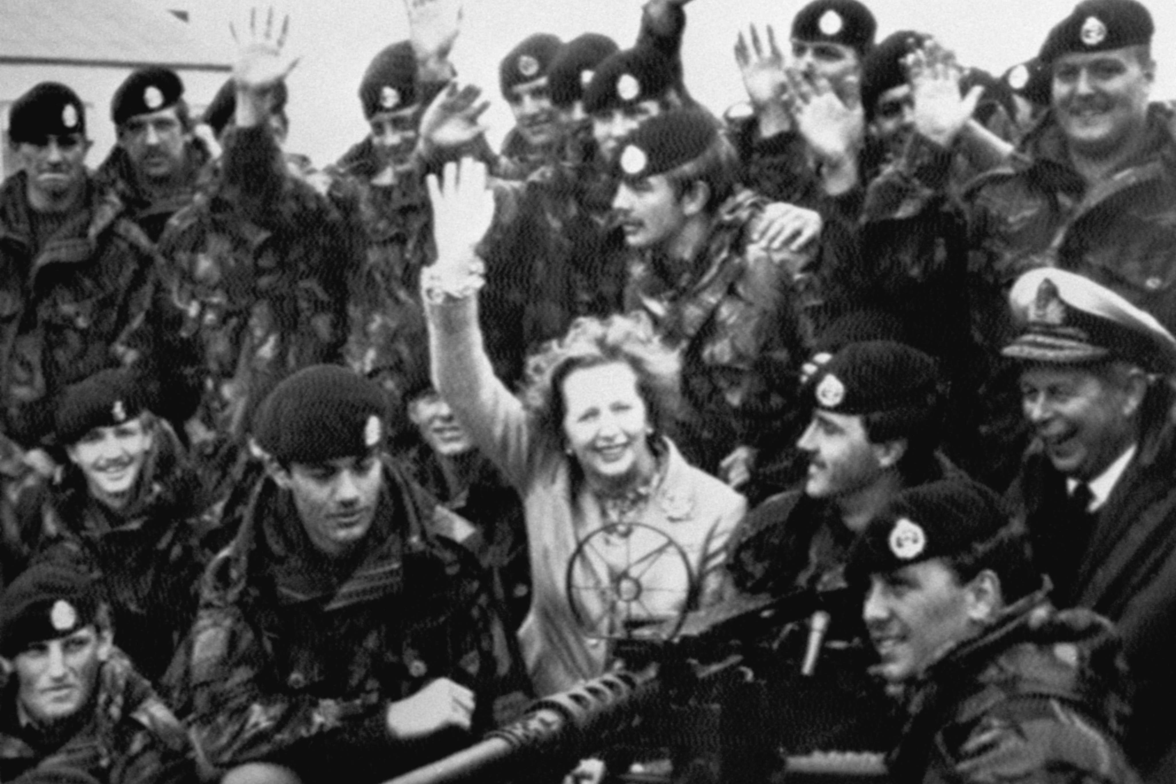 ‘Y’ company of the 1st Battalion the Royal Hampshire Regiment ‘The Tigers’ surround Prime Minister Margaret Thatcher and Chief of Naval Staff Admiral Sir John Fieldhouse at Goose Green, East Falkland (PA Archive)