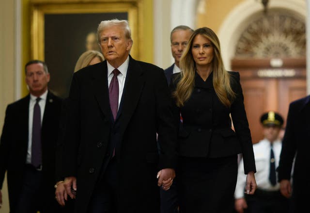 <p>President-elect Donald Trump and former First Lady Melania Trump arrive to pay their respects in front of the flag-draped casket of former President Jimmy Carter at the US Capitol Rotunda in Washington, DC, on January 8, 2025. Trump reportedly met with GOP lawmakers  Wednesday, where they discussed plans to have Canada join the union </p>