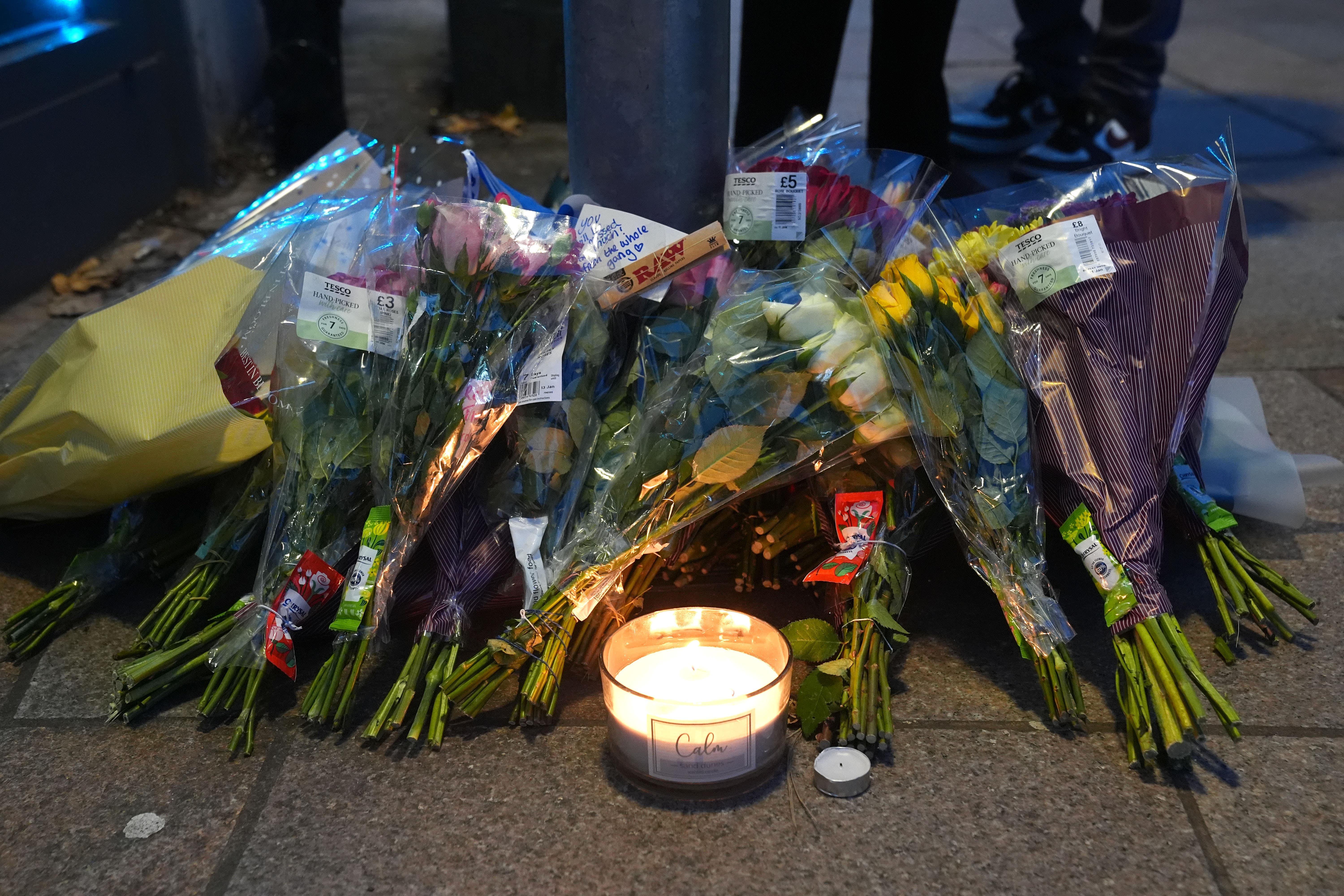 Floral tributes near Greenhill Street, close to Bedford bus station, following the stabbing of Thomas Taylor (Lucy North/PA)