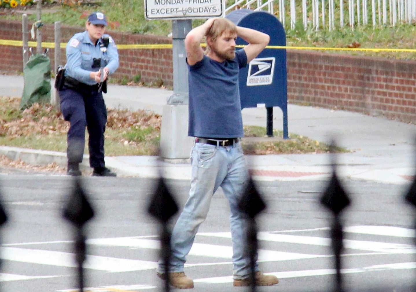 Edgar Maddison Welch, of Salisbury, N.C., surrenders to police, in Washington, D.C. in 2016.