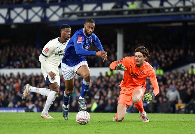 <p>Beto eases past the Peterborough goalkeeper </p>
