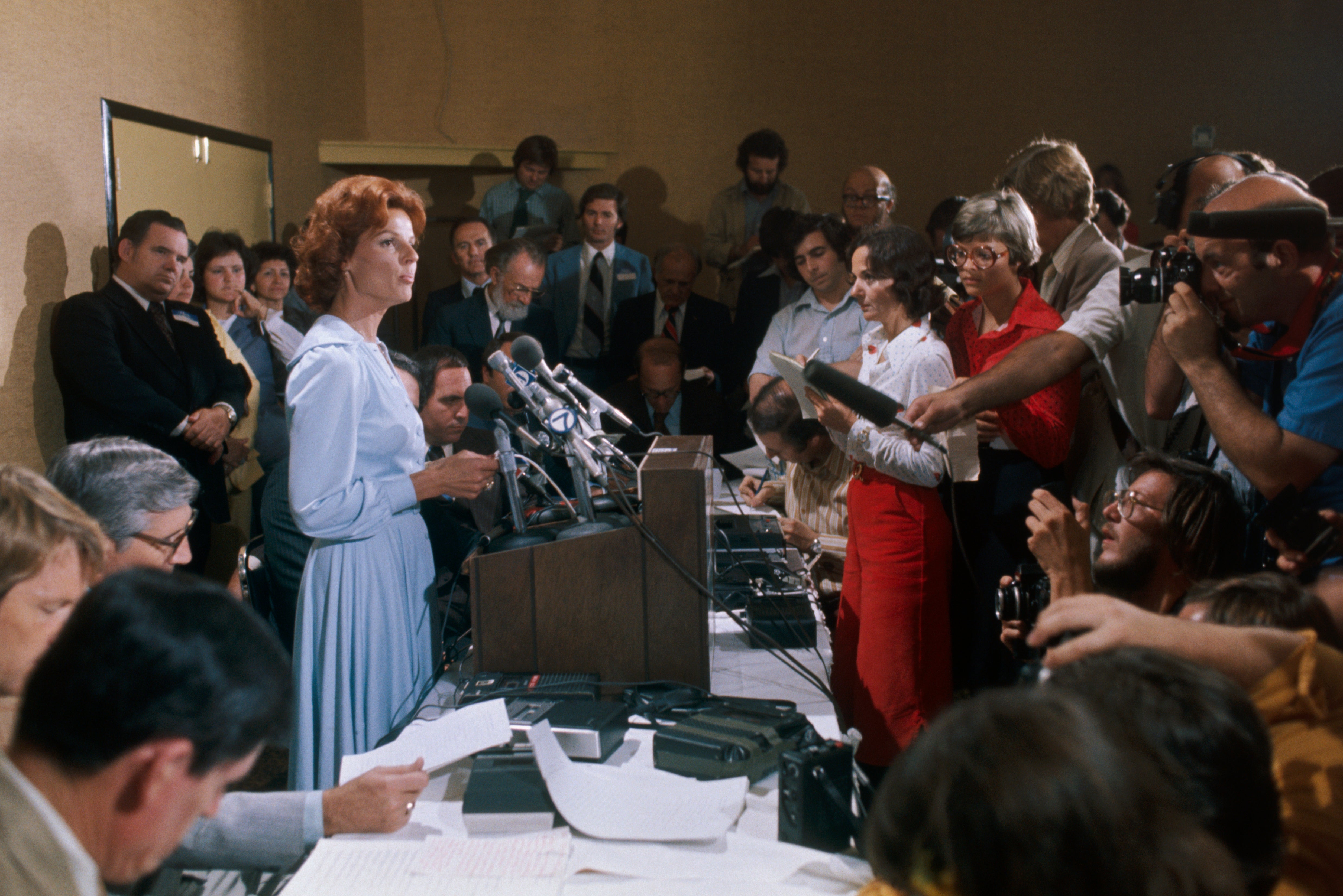 Bryant speaks at a press conference in 1977