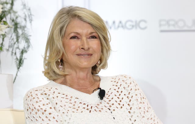 <p>Martha Stewart posed in a light blue denim shirt, matching jeans, and black flats in her new advertisement with the brand</p>