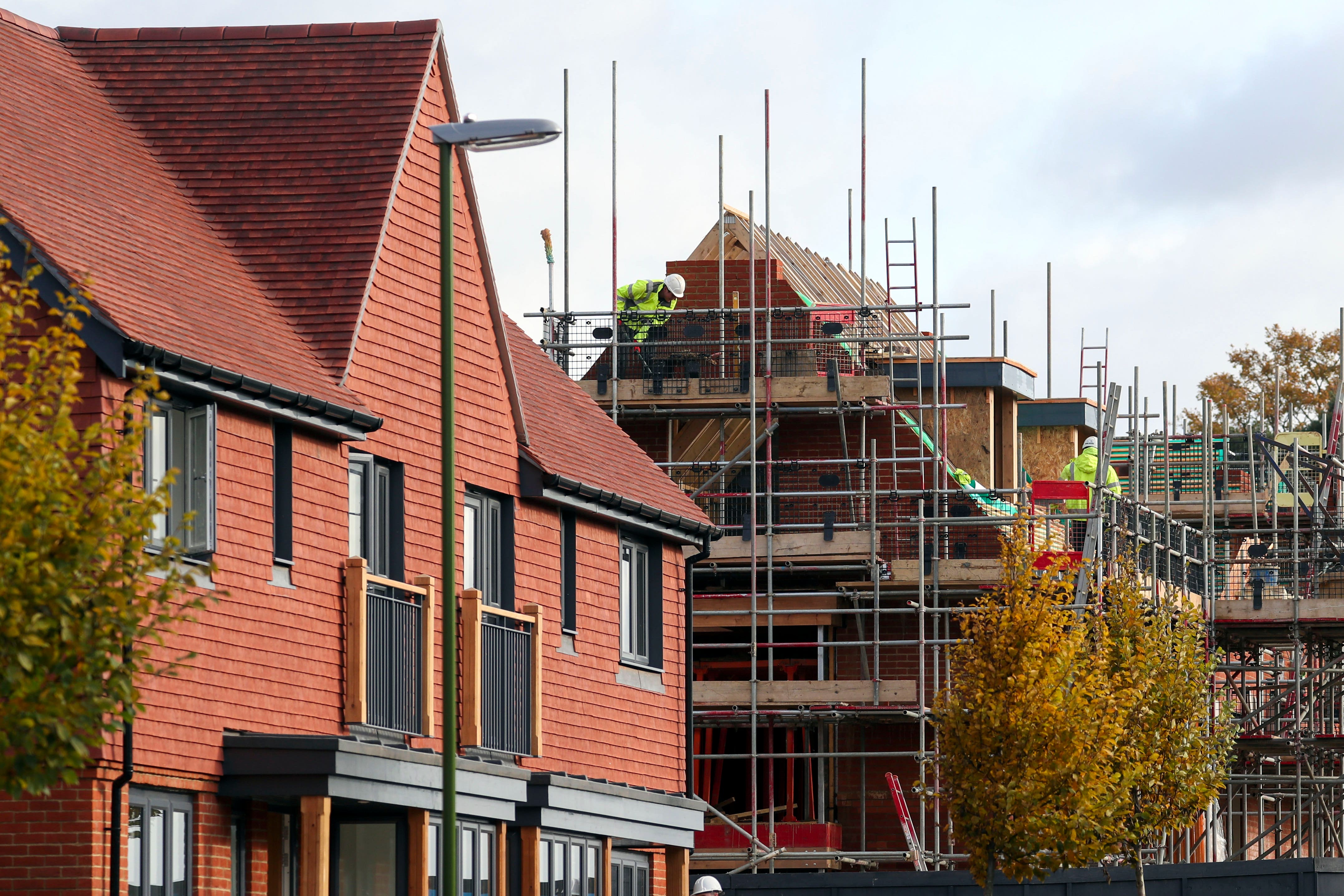 Some of the UK’s biggest housebuilders will say whether demand is picking (Steve Parsons/PA)