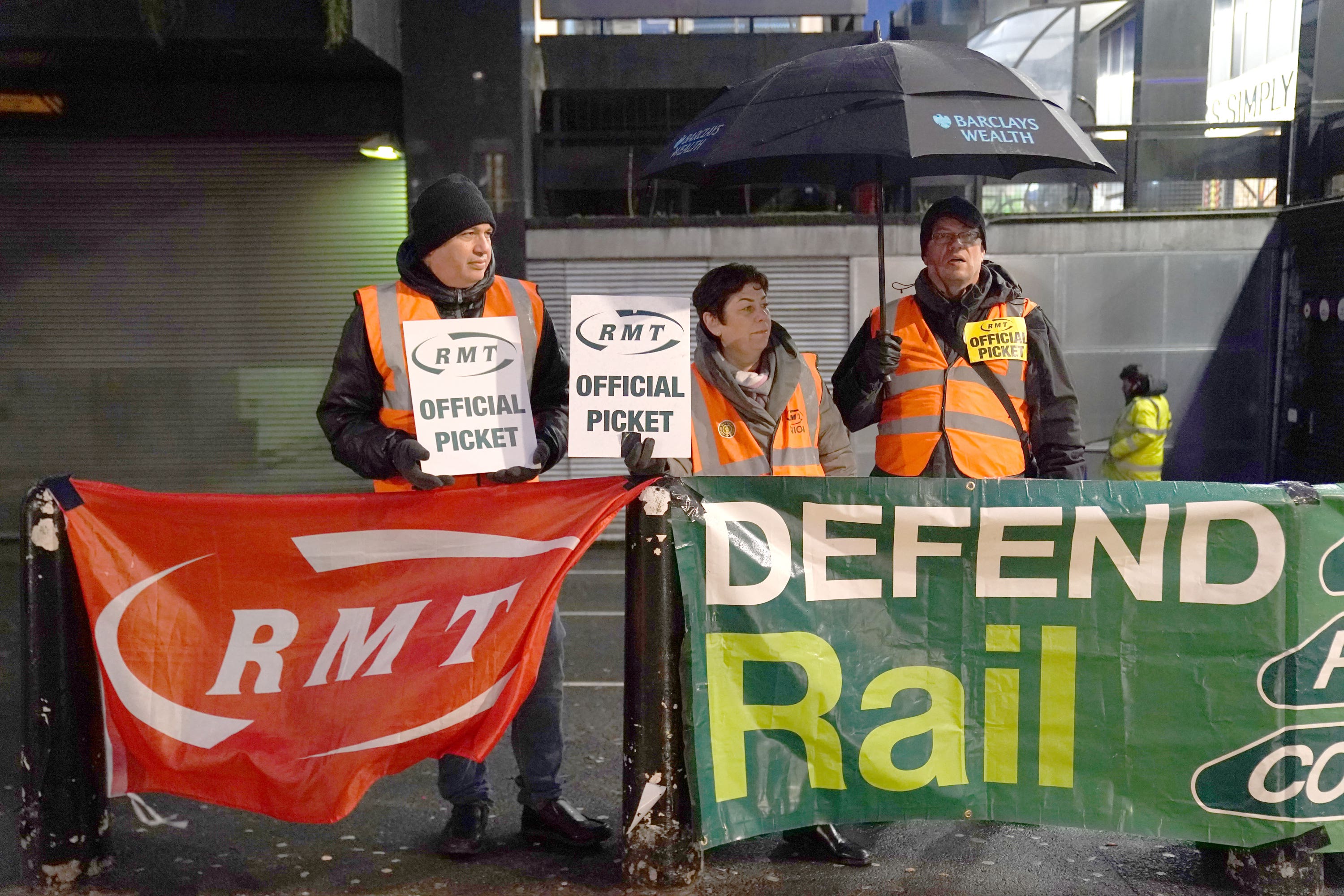 Members of the Rail, Maritime and Transport union on the picket line outside Euston station (Kirsty O’Connor/PA)