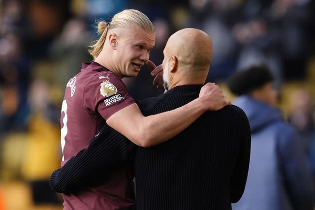 Erling Haaland (left) and Manchester City manager Pep Guardiola (Nick Potts/PA)