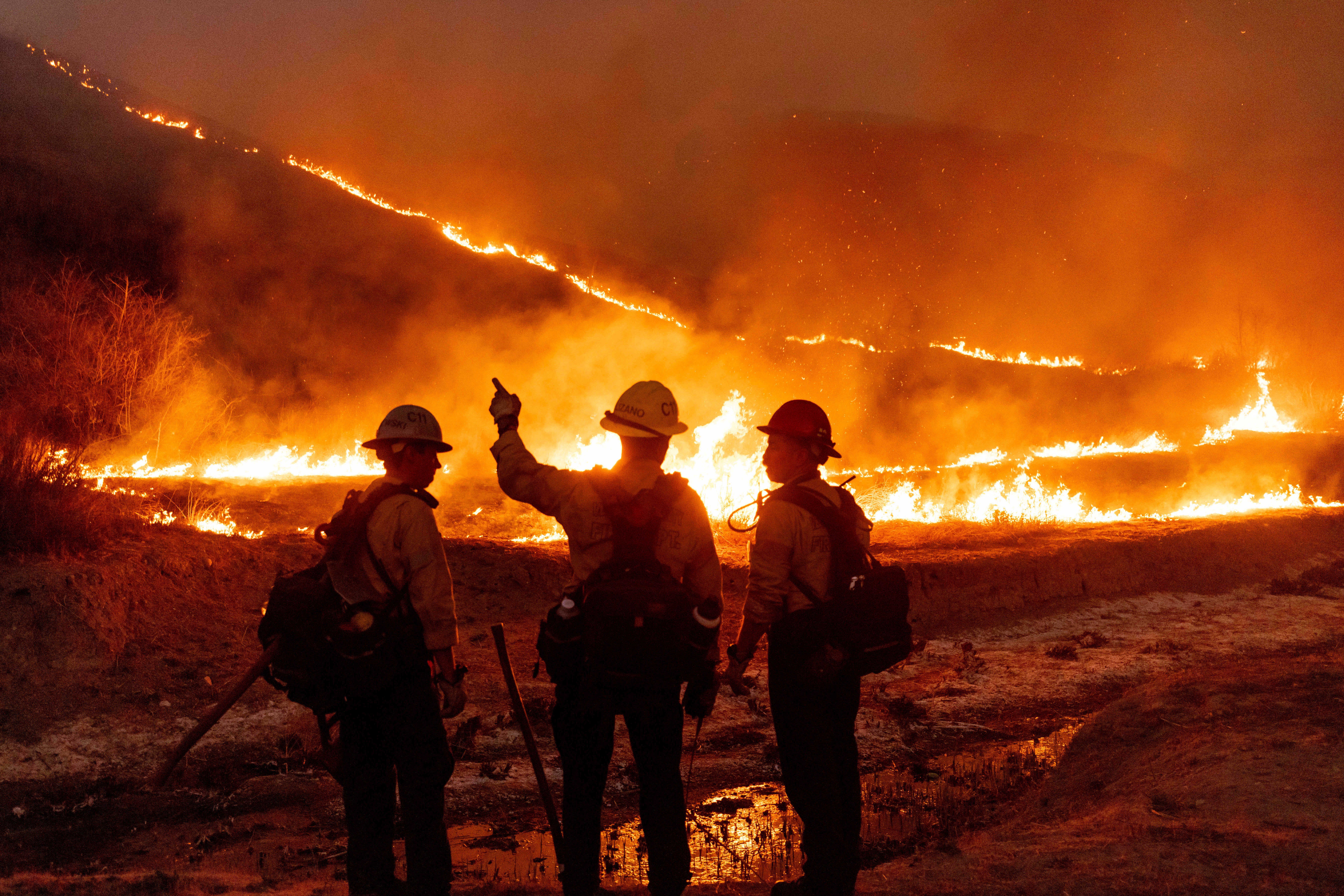 Fire crews battle the Kenneth Fire in the West Hills section of Los Angeles, California, on Thursday. Only the Eaton Fire is not yet contained